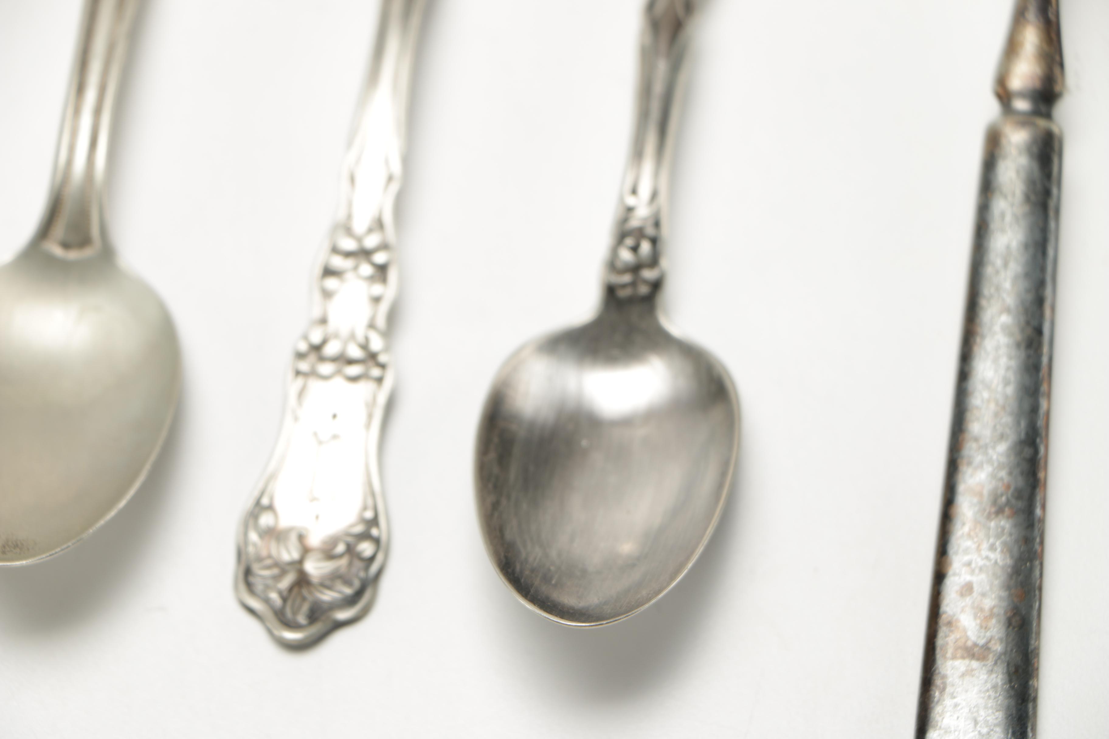 Assorted Silver Plate Flatware Featuring C.D Peacock