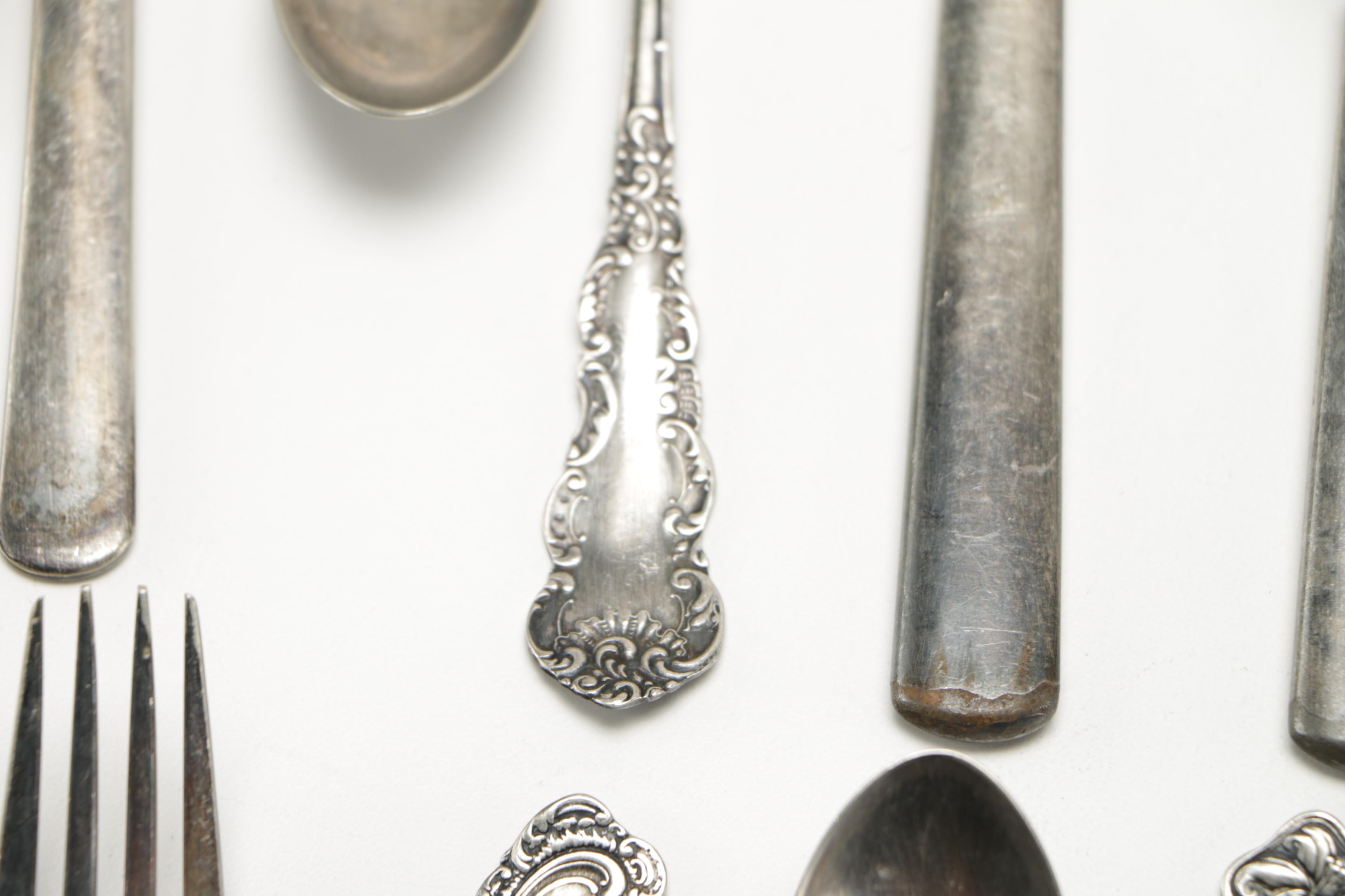 Assorted Silver Plate Flatware Featuring C.D Peacock