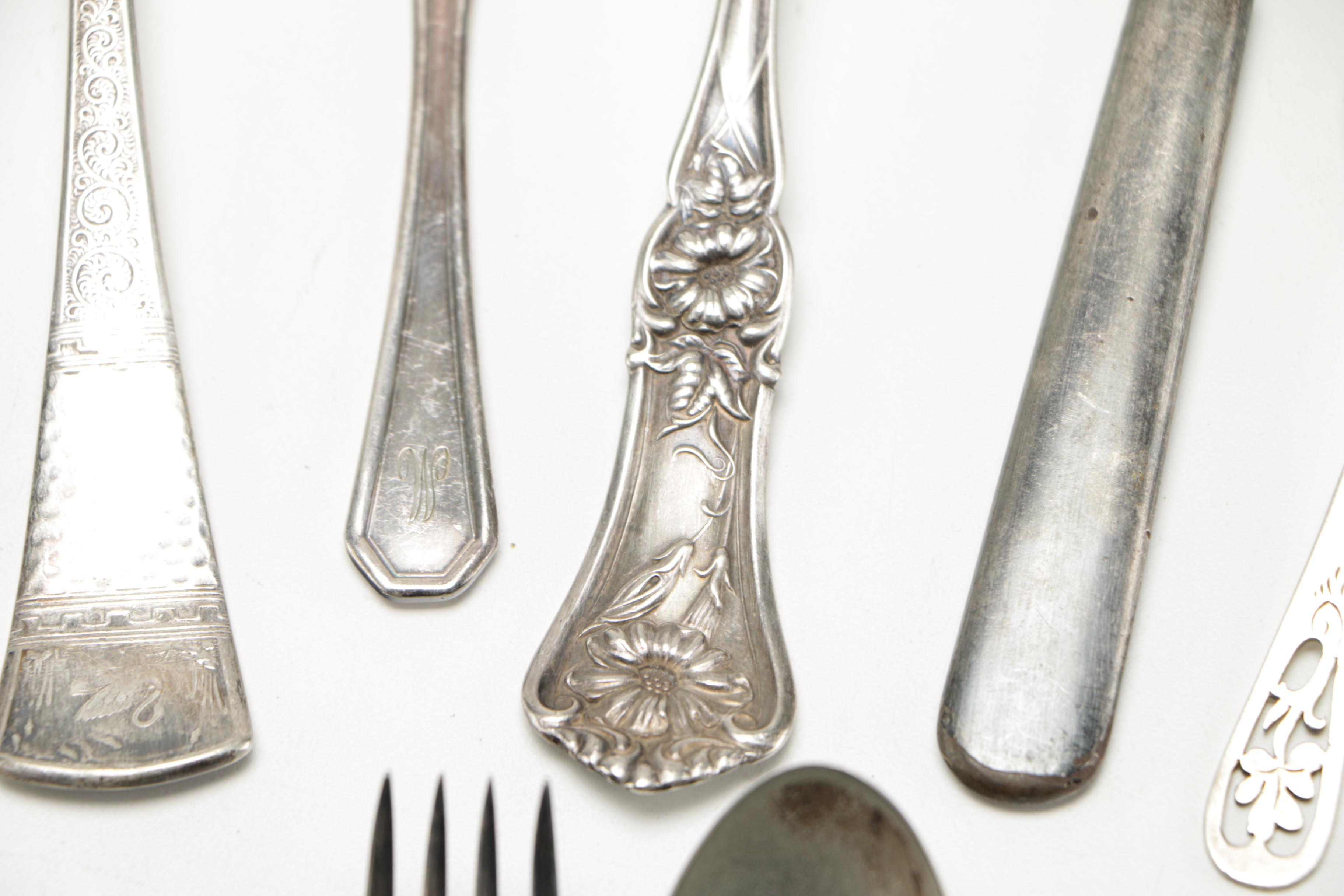 Assorted Silver Plate Flatware Featuring C.D Peacock
