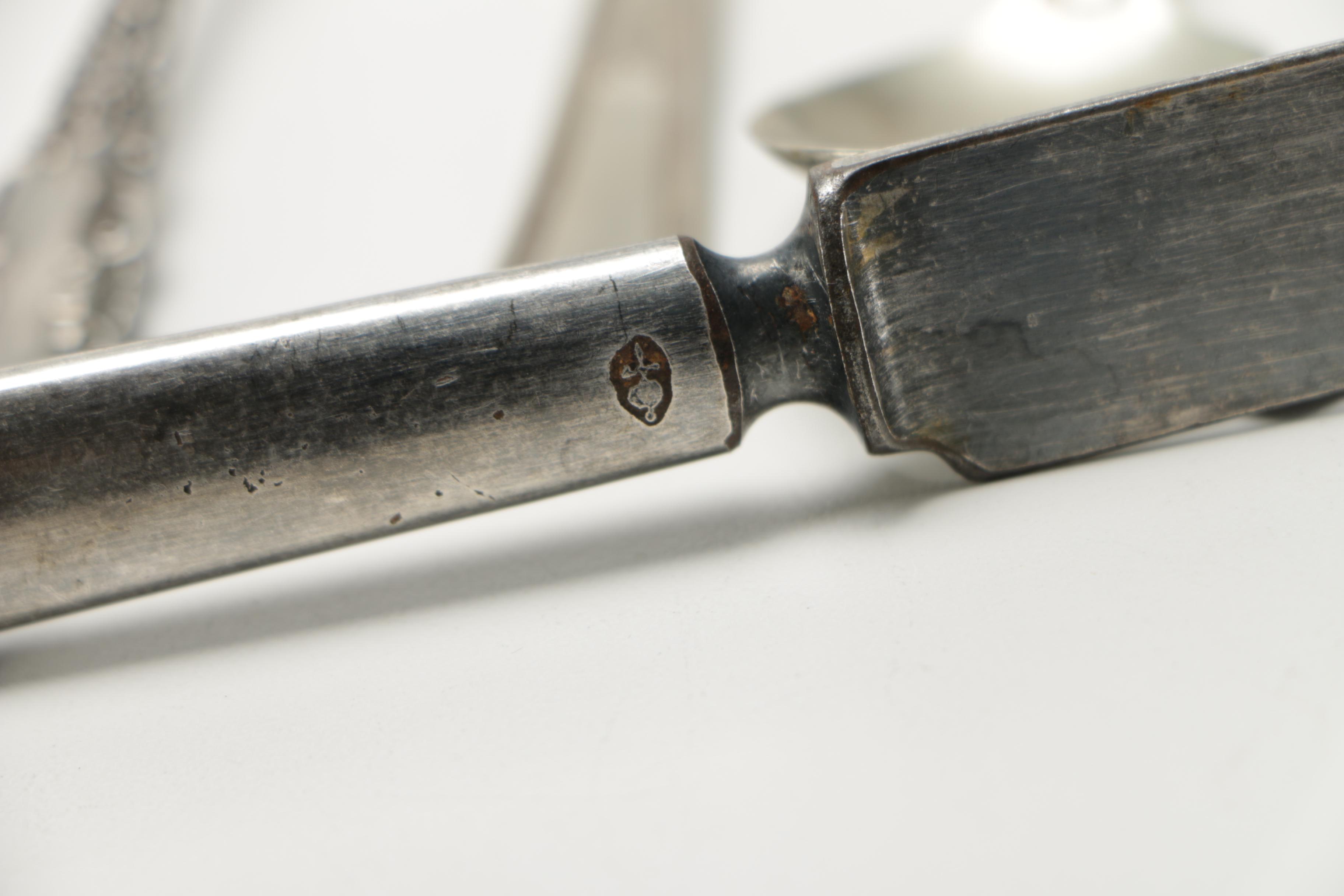 Assorted Silver Plate Flatware Featuring C.D Peacock