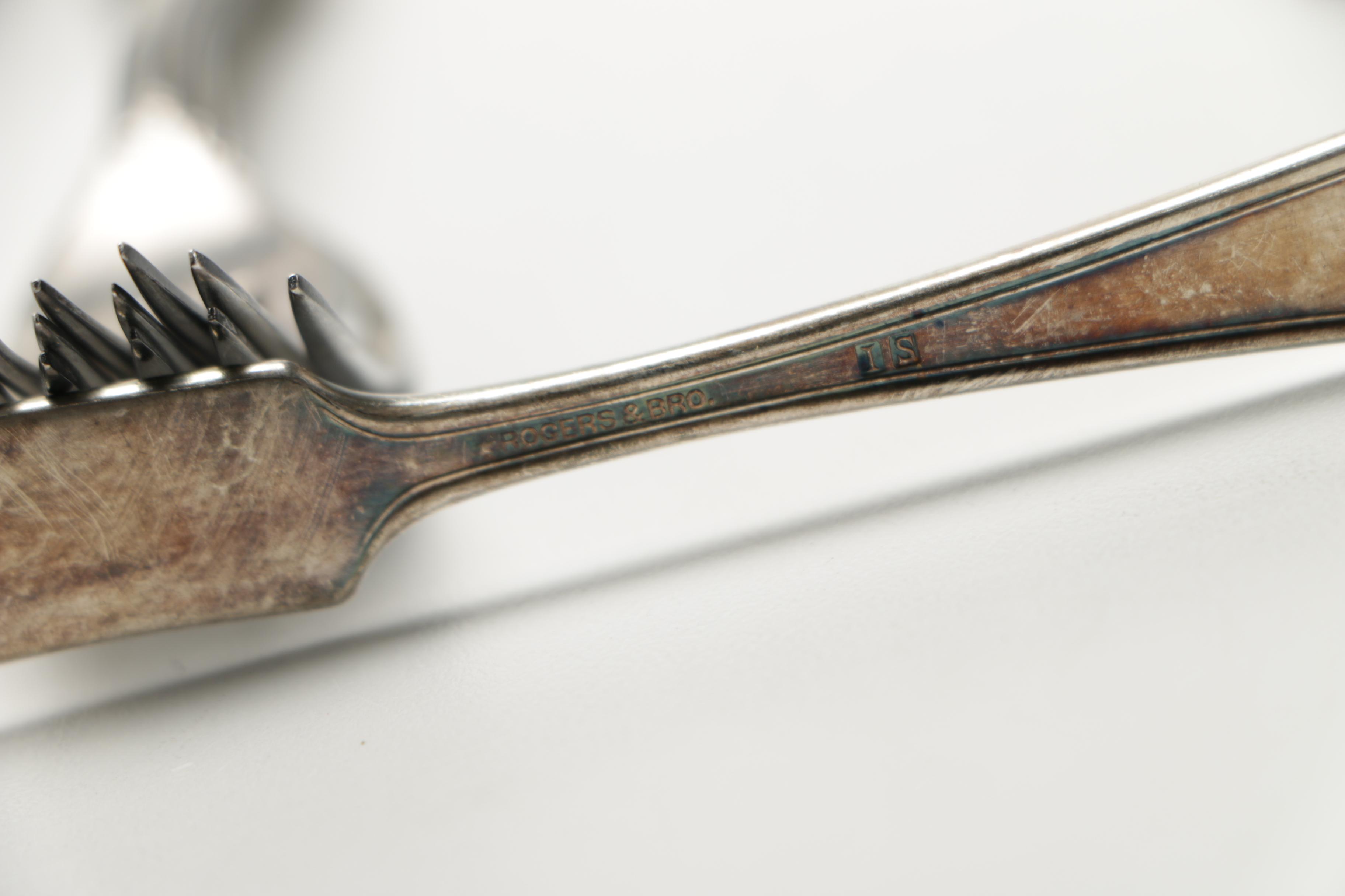 Assorted Silver Plate Flatware Featuring C.D Peacock