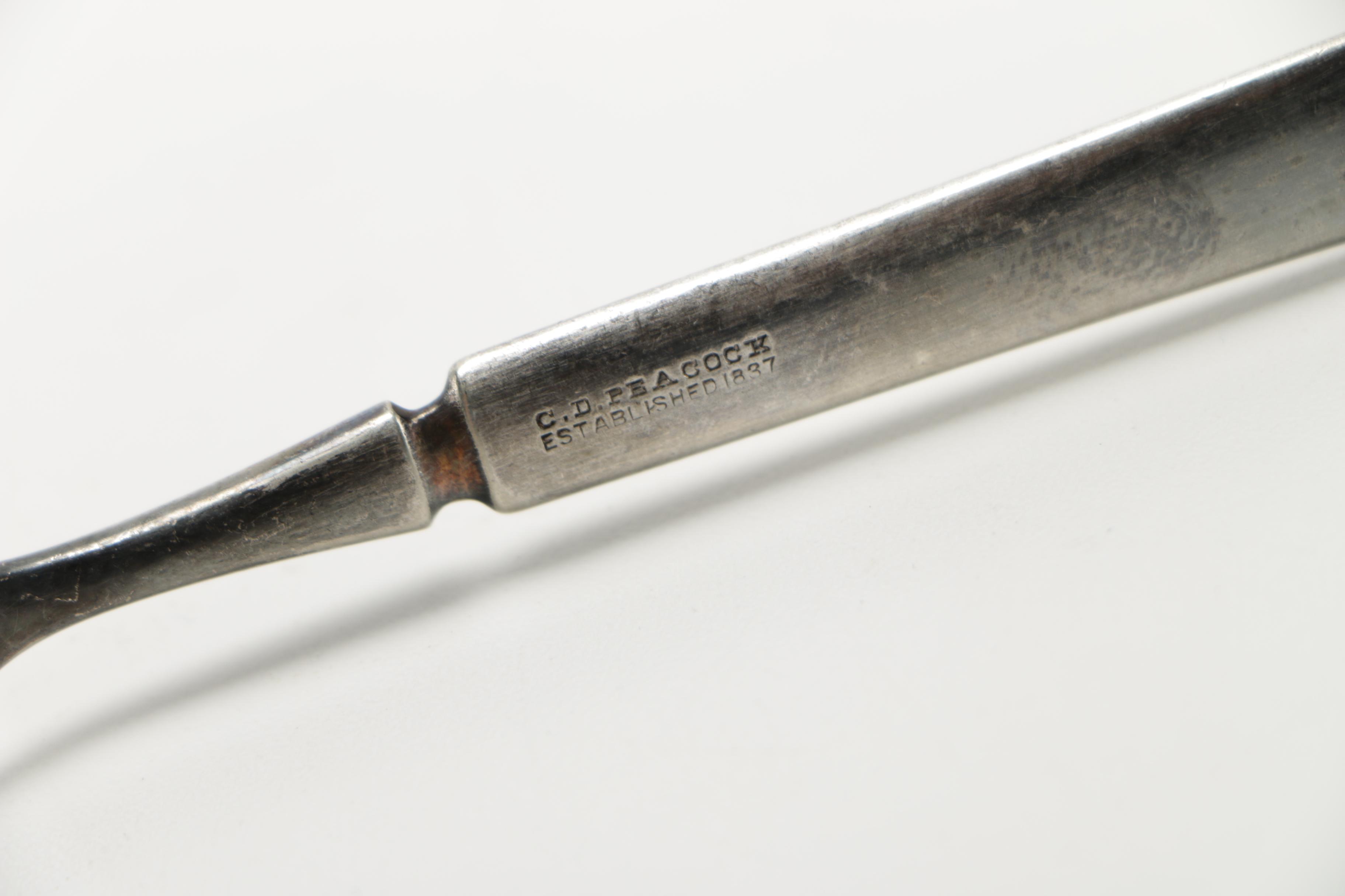 Assorted Silver Plate Flatware Featuring C.D Peacock