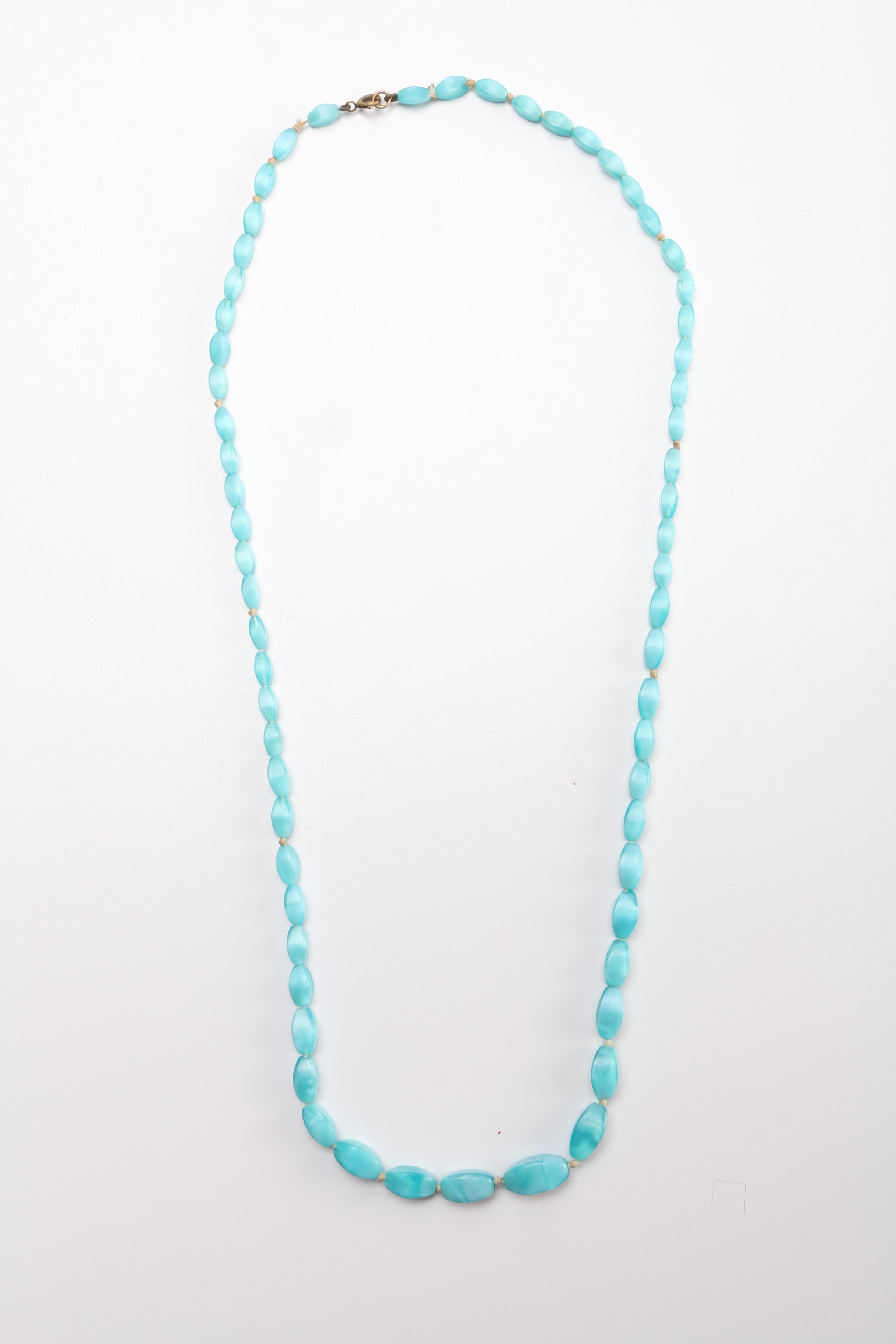 Costume Jewelry Assortment Featuring Bangles