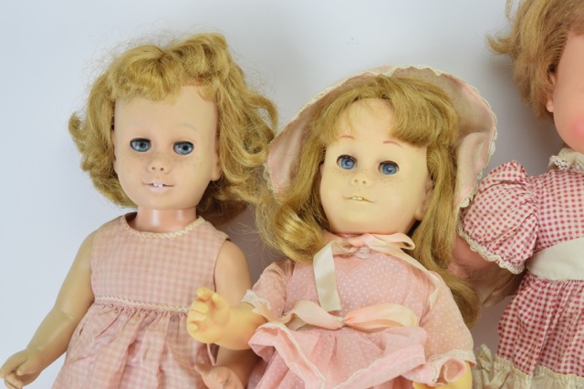 Three Vintage Chatty Cathy Dolls, A Chatty Baby Brother and a Kissy Doll