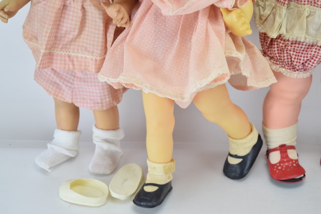 Three Vintage Chatty Cathy Dolls, A Chatty Baby Brother and a Kissy Doll