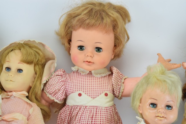 Three Vintage Chatty Cathy Dolls, A Chatty Baby Brother and a Kissy Doll