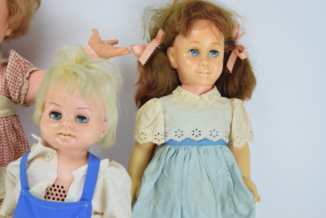 Three Vintage Chatty Cathy Dolls, A Chatty Baby Brother and a Kissy Doll