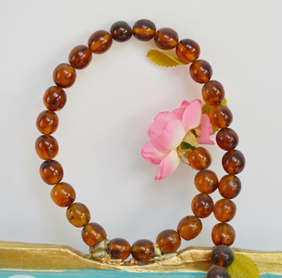 Two Wood Handbag-Shaped Birdhouses