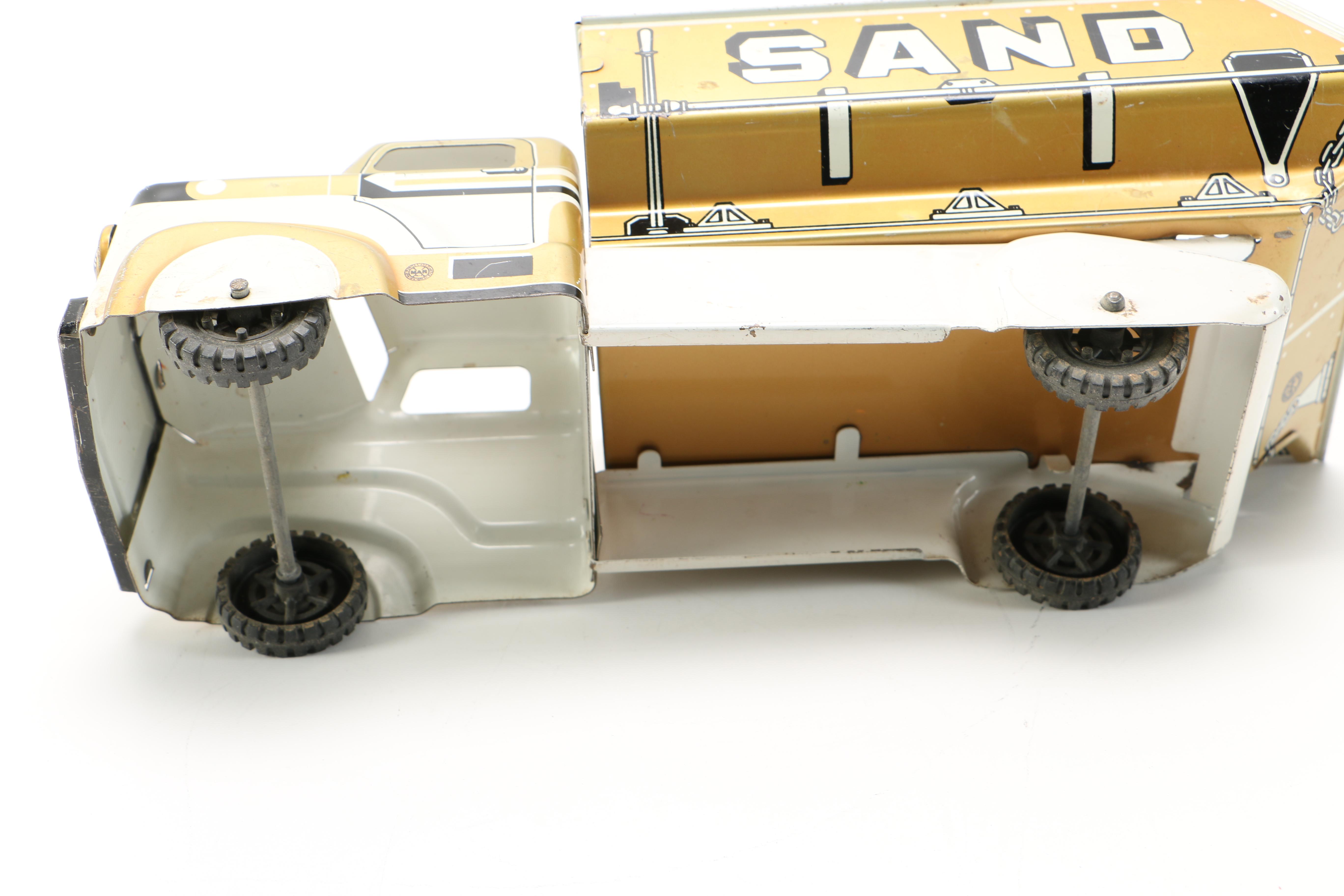 Three Die-Cast Toy Vehicles