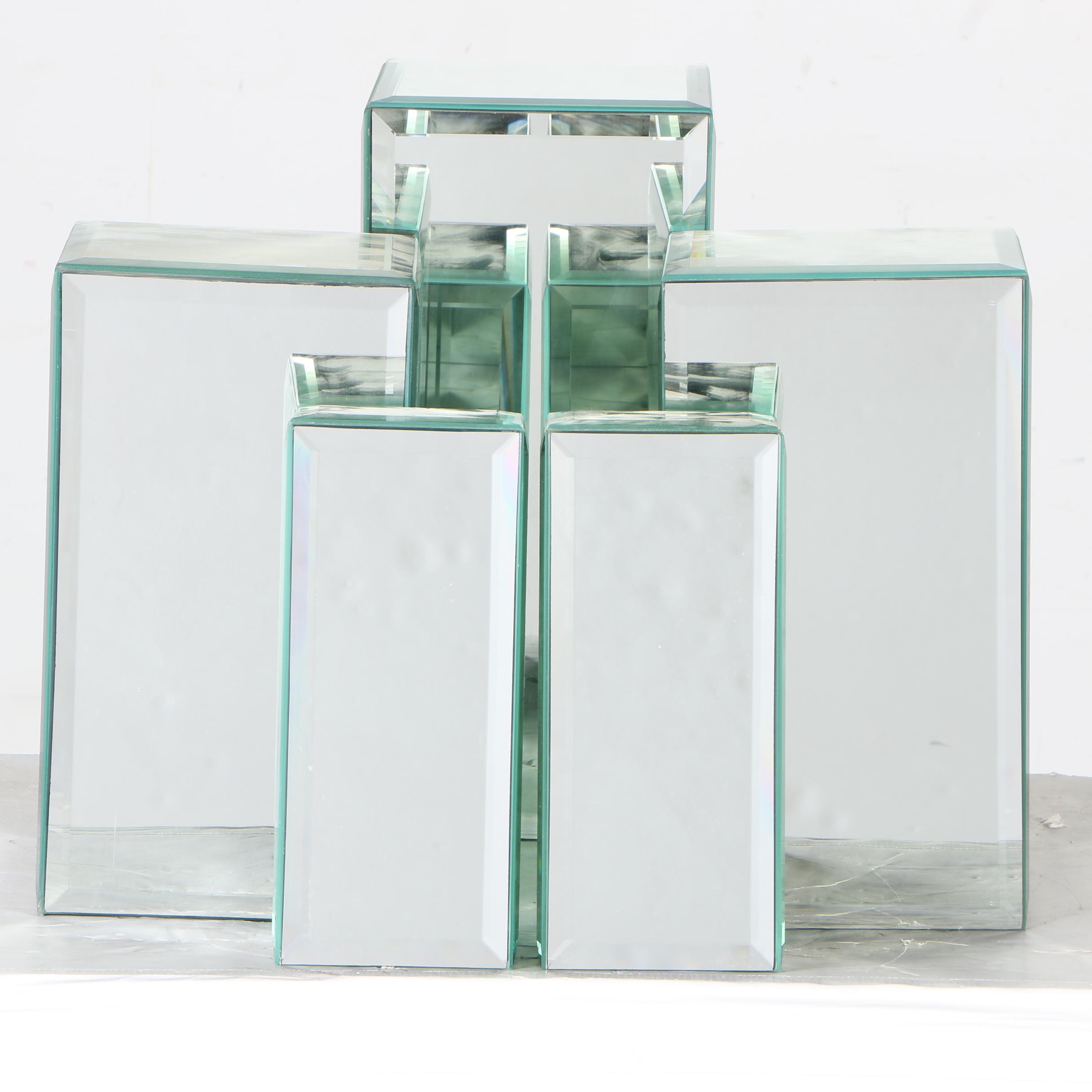 Five Mirrored Pedestals With Beveled Edges
