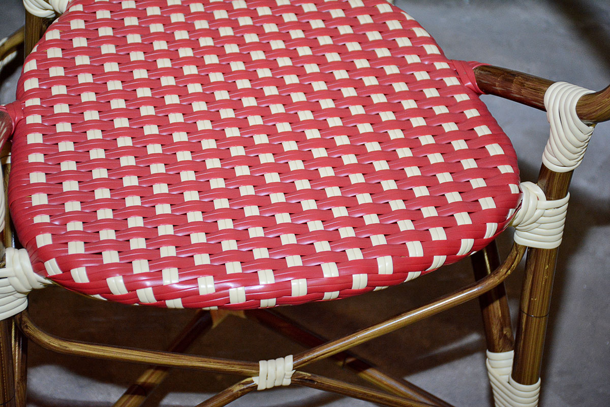 Red and White Woven Rattan Chairs