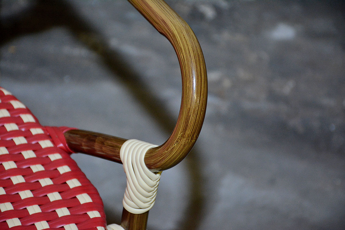 Red and White Woven Rattan Chairs