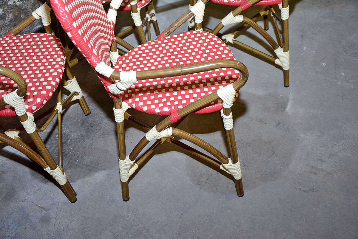 Red and White Woven Rattan Chairs