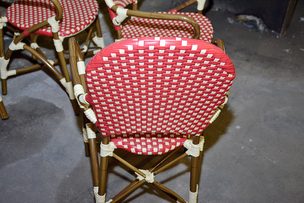 Red and White Woven Rattan Chairs