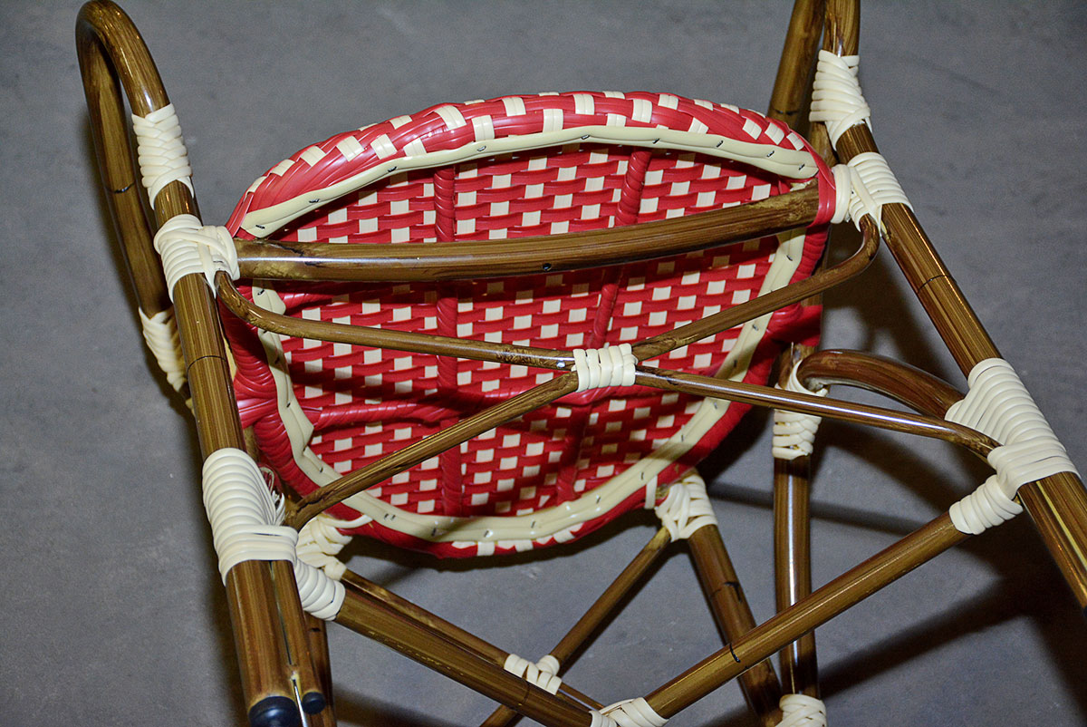 Red and White Woven Rattan Chairs
