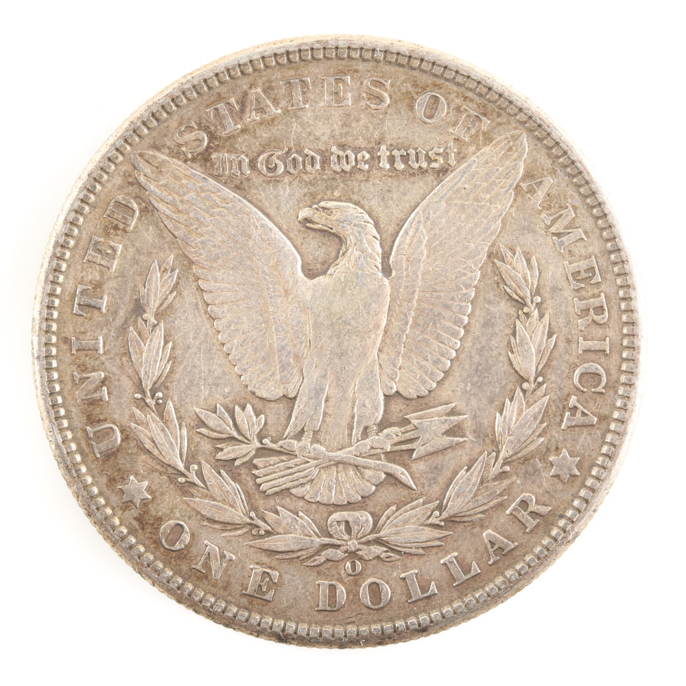 Five U.S. Silver Dollars and a Silver Half Dollar