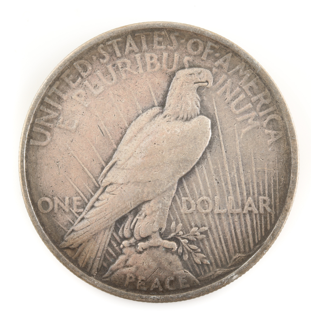 Five U.S. Silver Dollars and a Silver Half Dollar