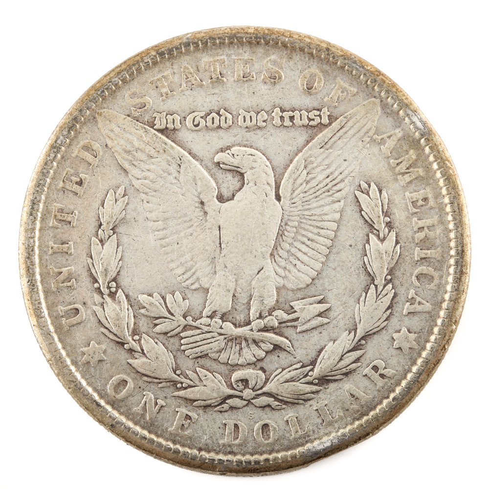 Five U.S. Silver Dollars and a Silver Half Dollar