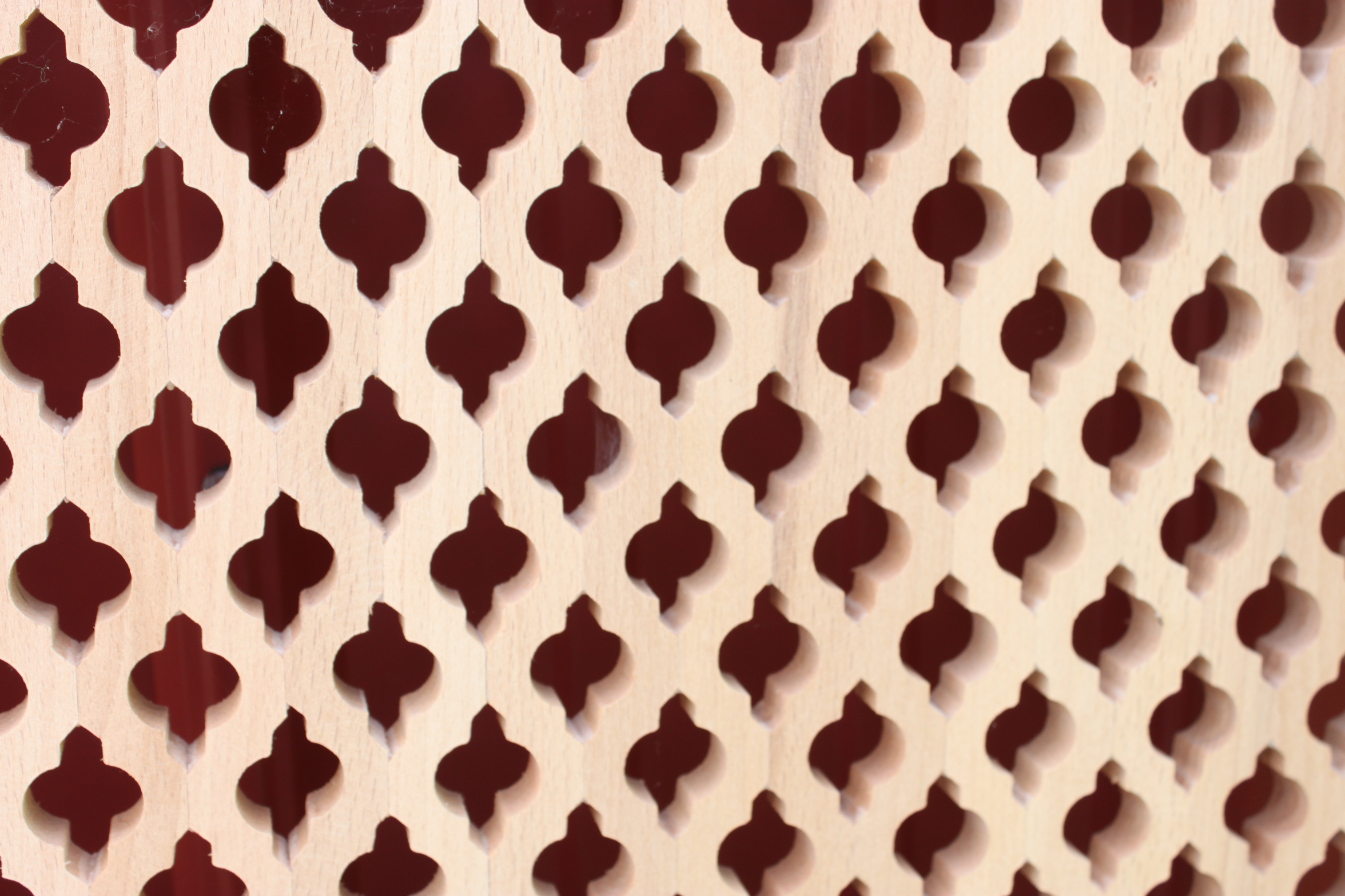 Two Perforated Wood Panels