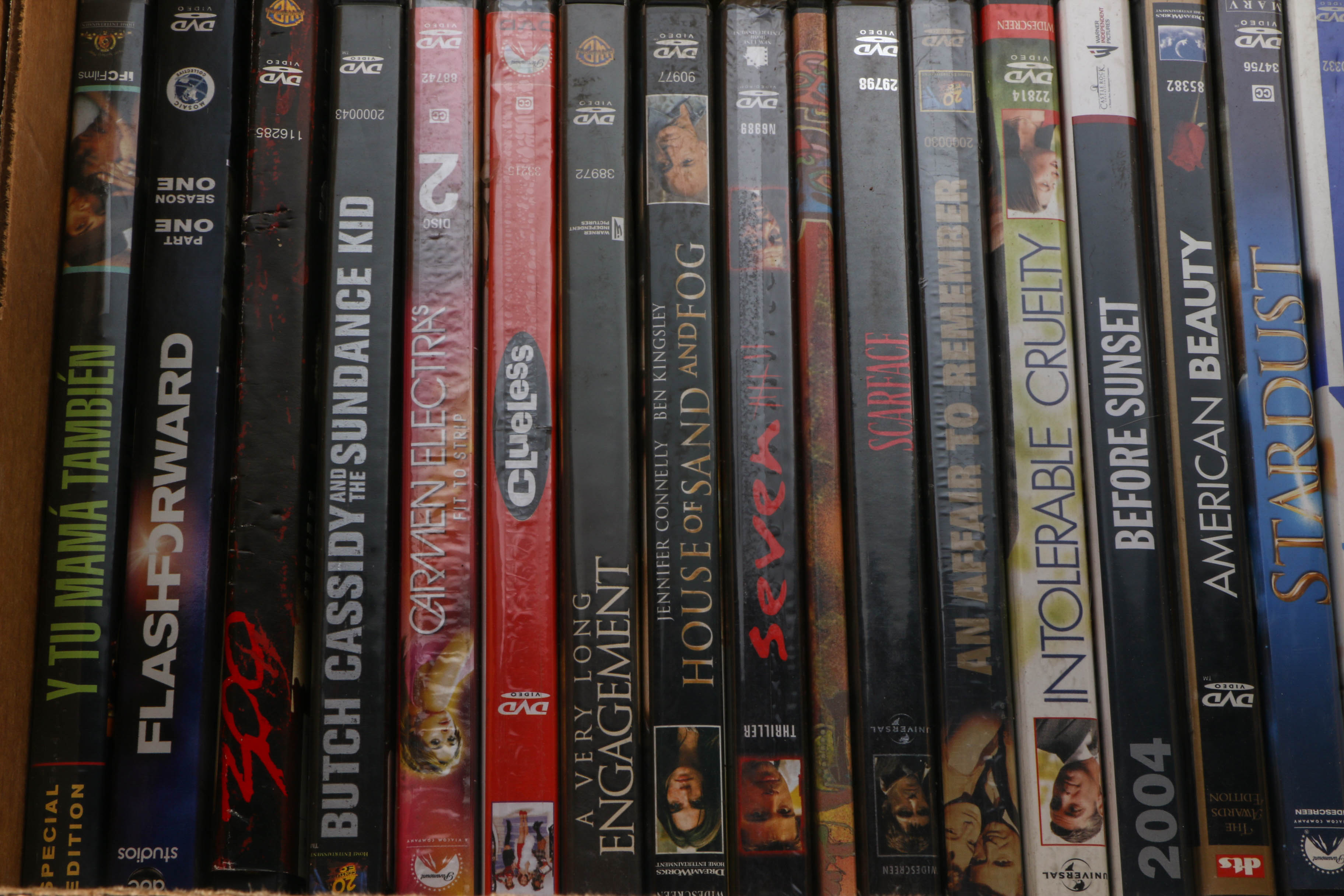 Naxa Portable DVD Player and DVD Collection