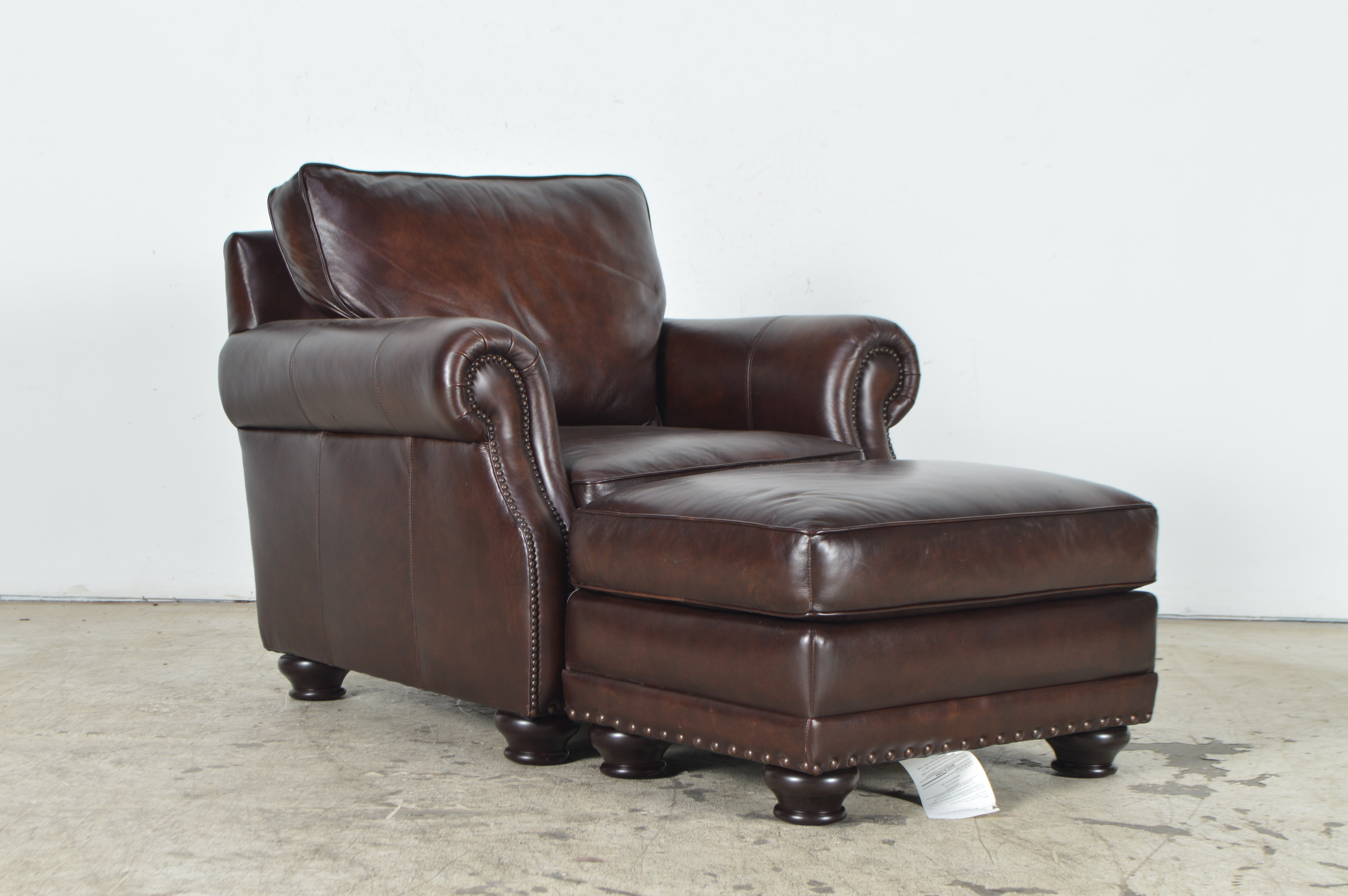 Havertys Furniture Brown Leather Armchair with Ottoman