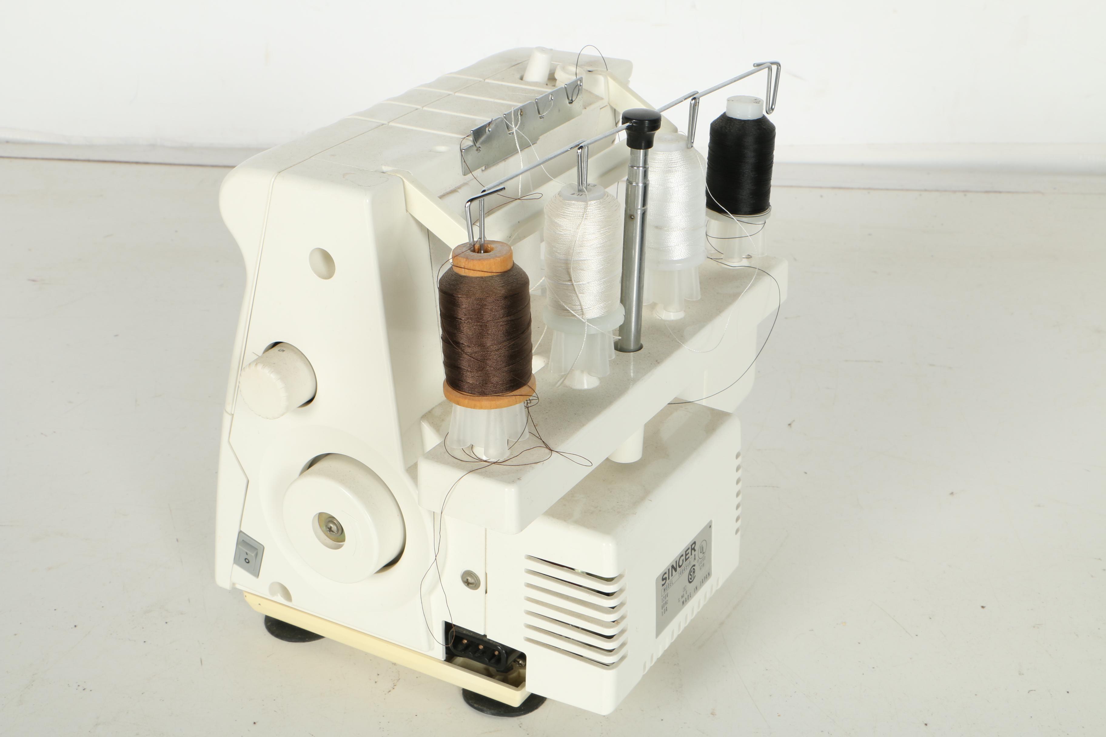 Two Singer Sewing Machines