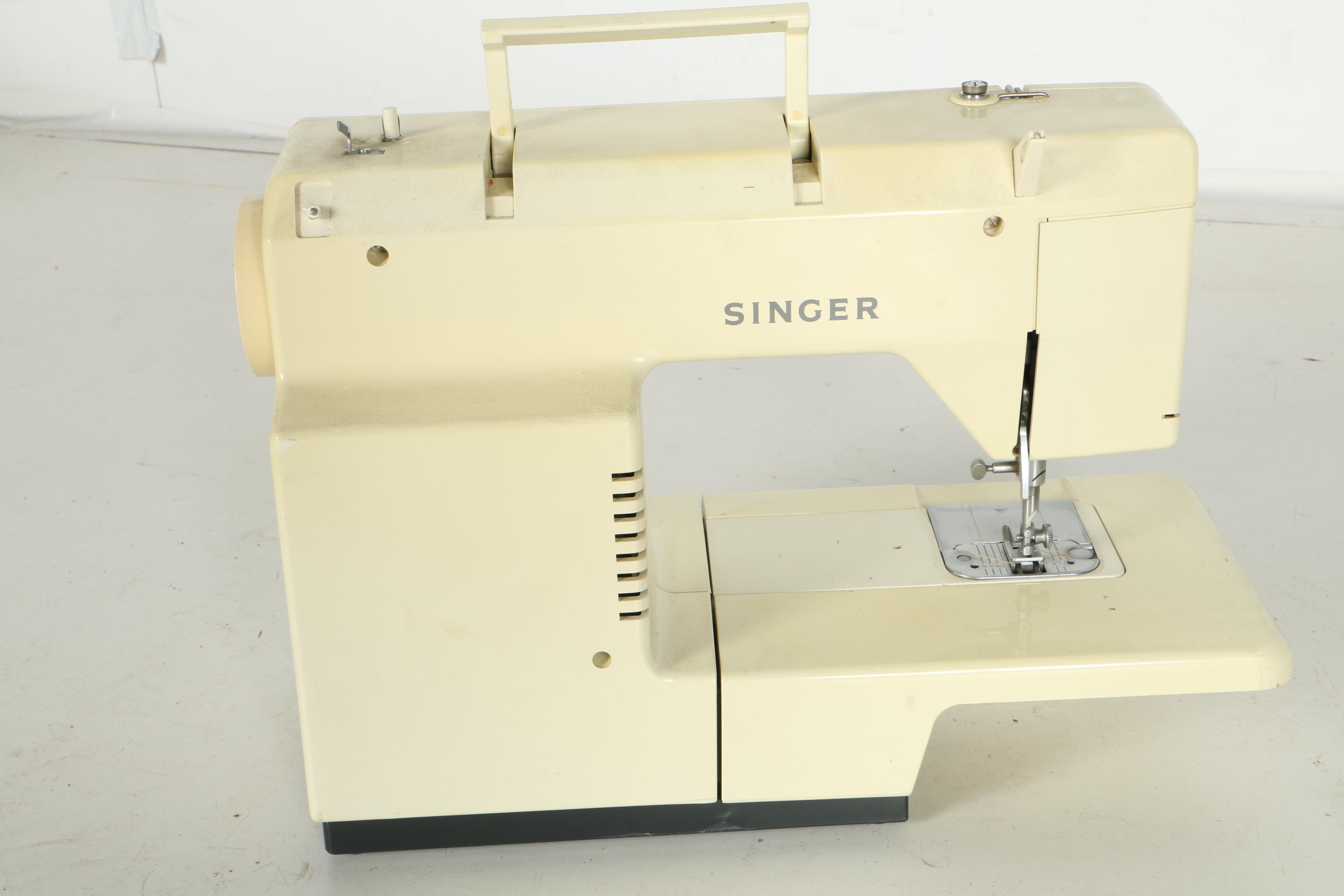 Two Singer Sewing Machines