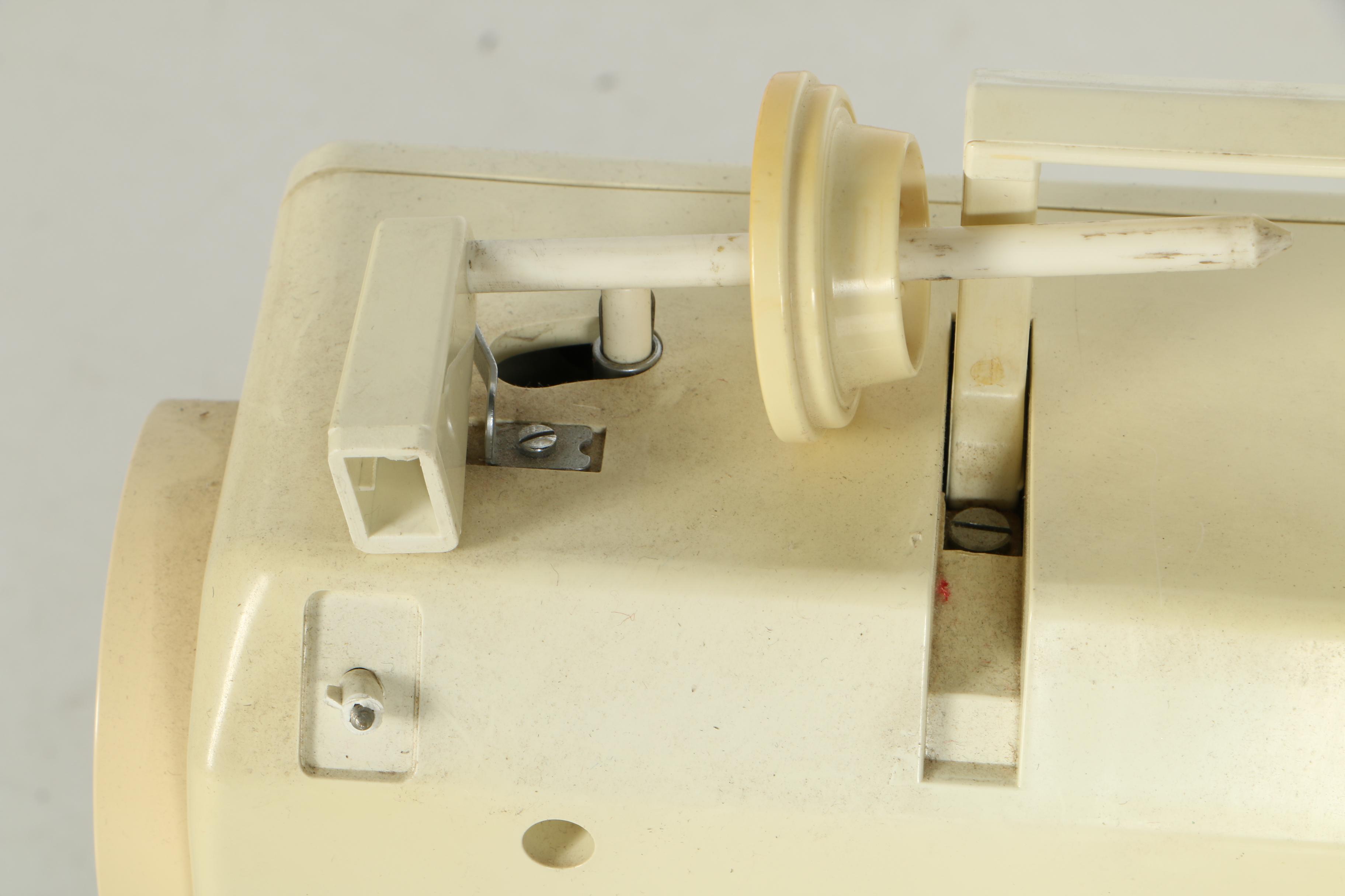 Two Singer Sewing Machines