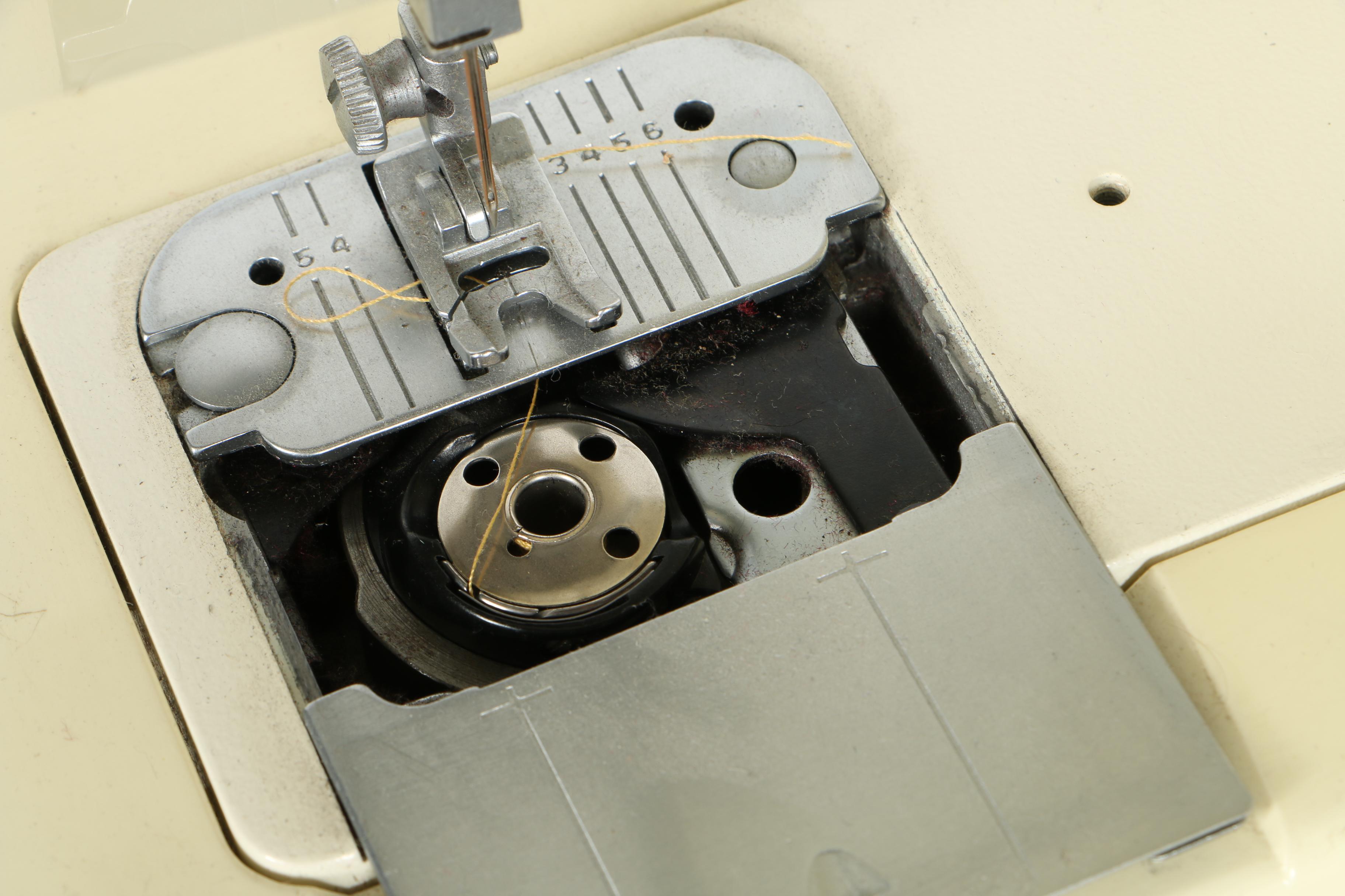 Two Singer Sewing Machines