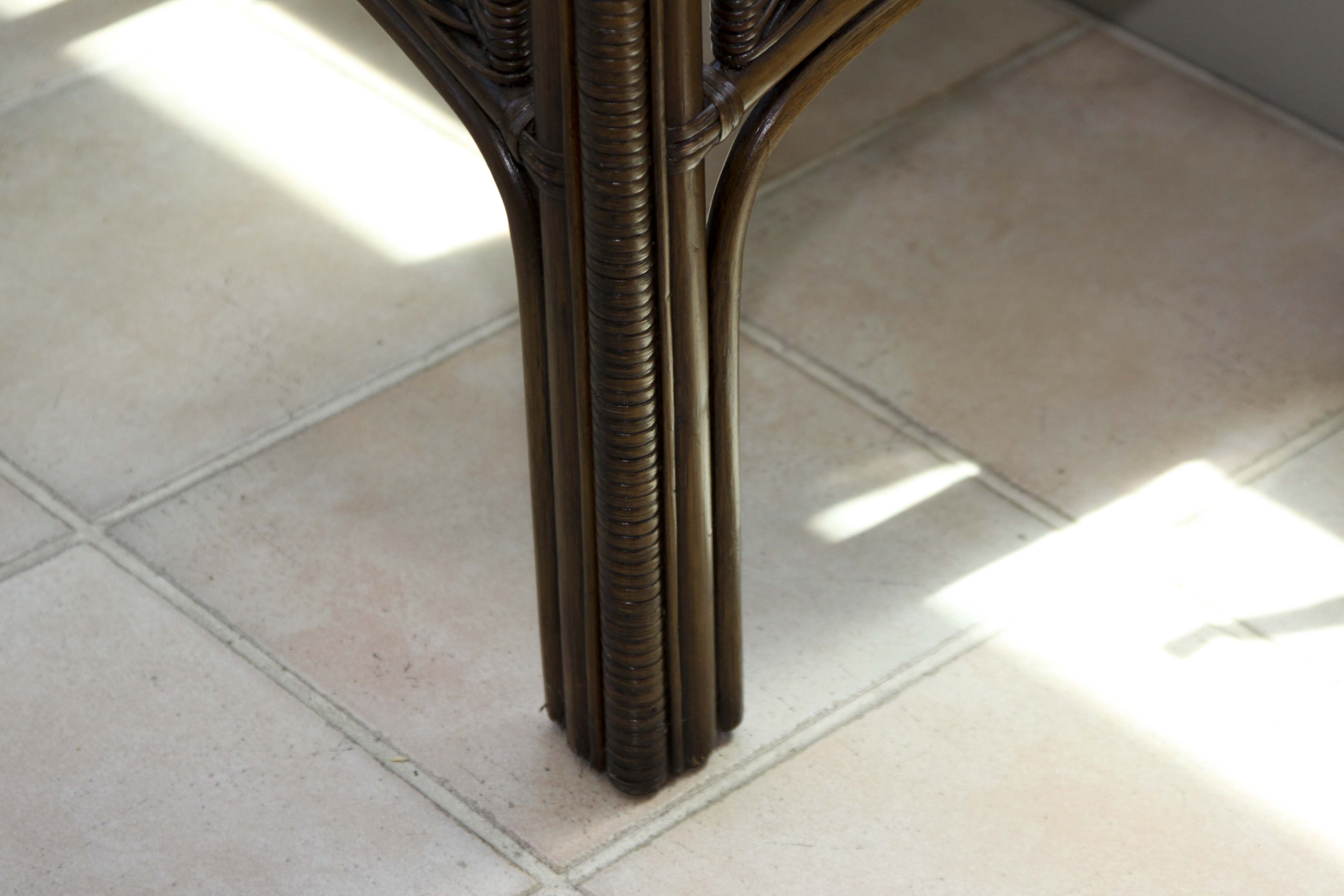 Wicker Arm Chair and Glass Top Side Table