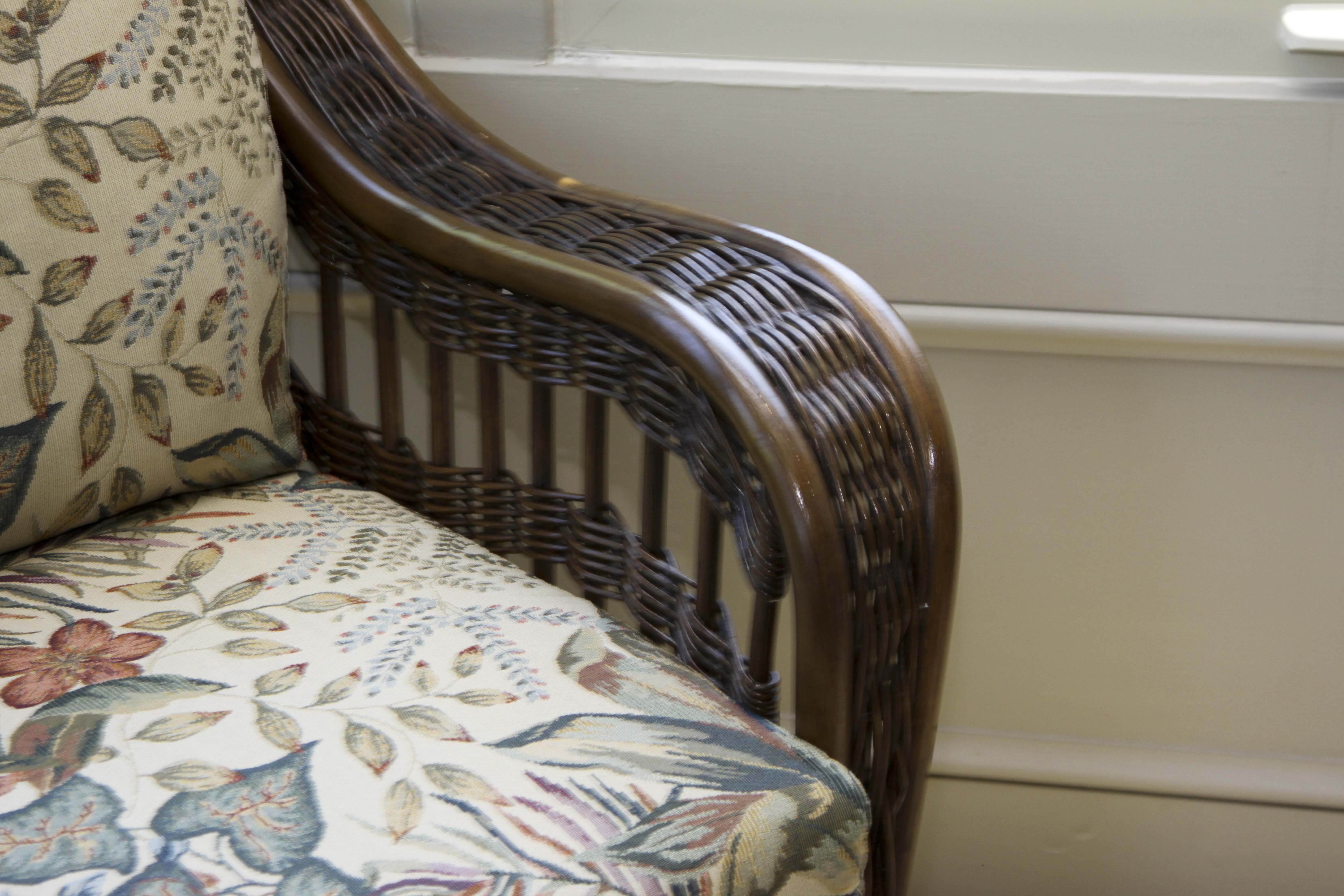 Wicker Arm Chair and Glass Top Side Table
