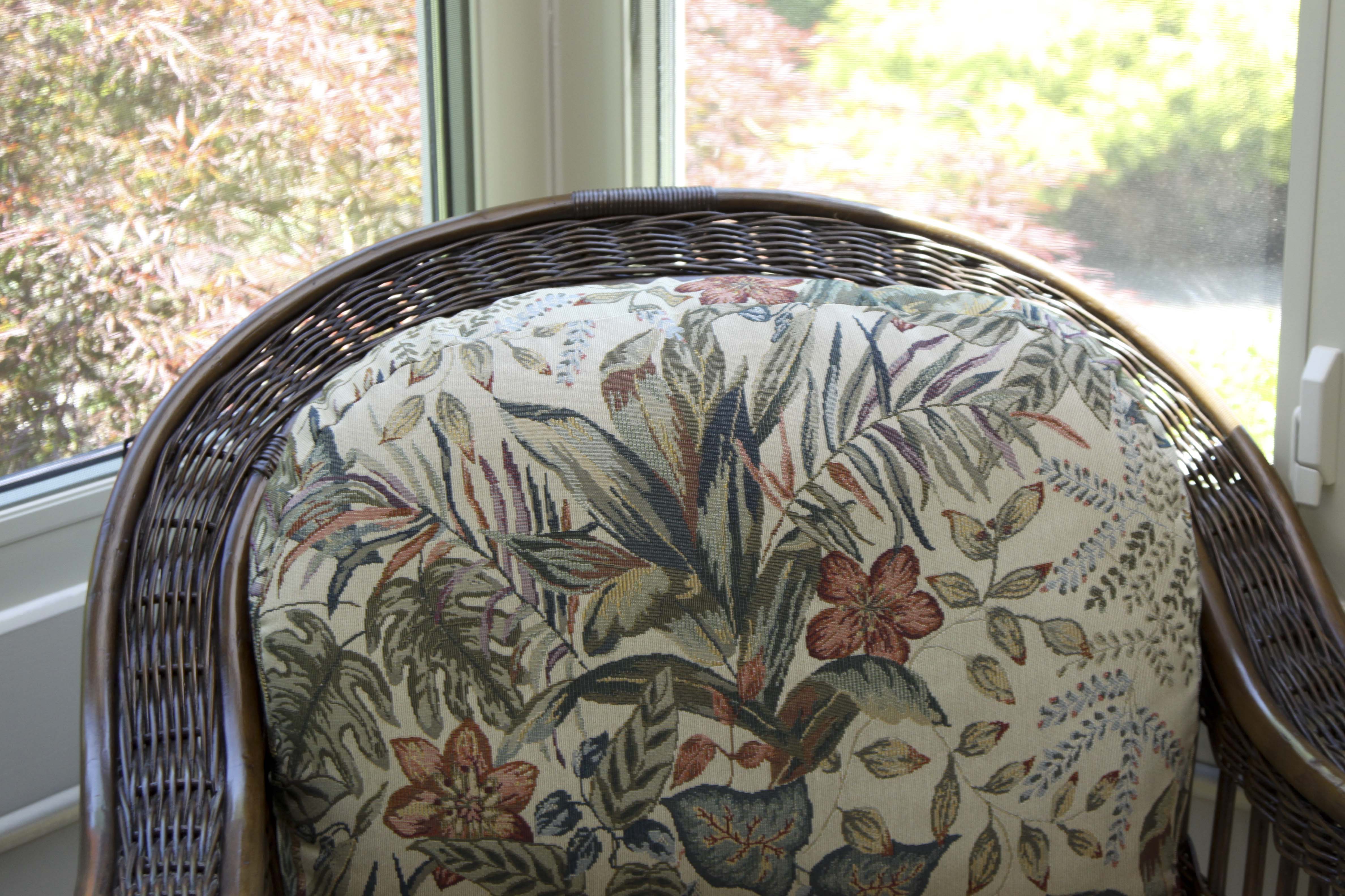 Wicker Arm Chair and Glass Top Side Table