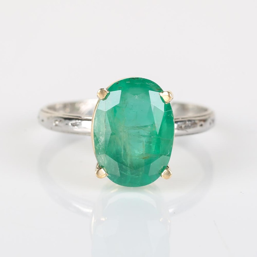 Platinum 3.49 CTS Emerald Ring with 18K Yellow Gold Prongs