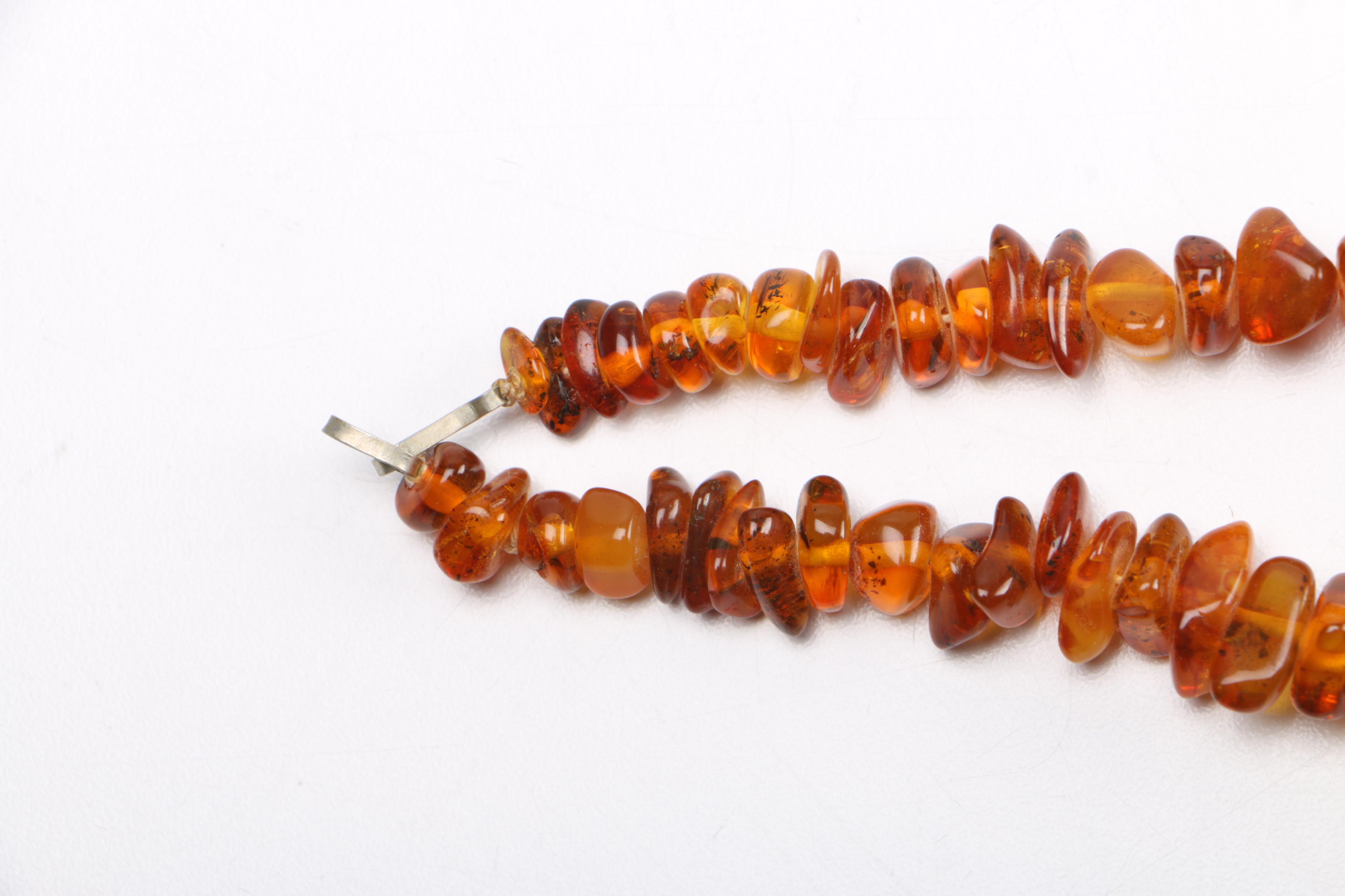 Selection of Costume Jewelry Including Amber Necklaces