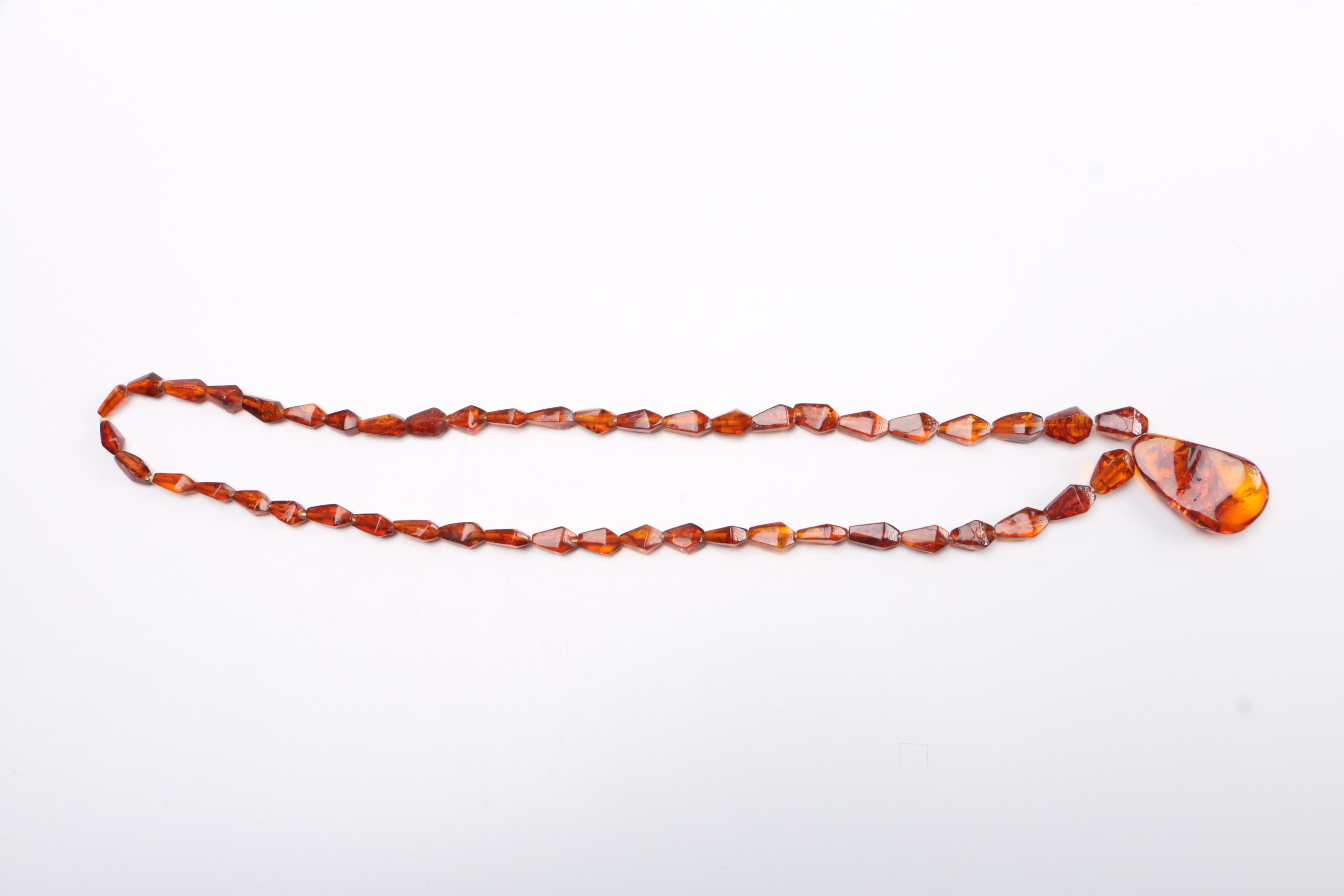 Selection of Costume Jewelry Including Amber Necklaces