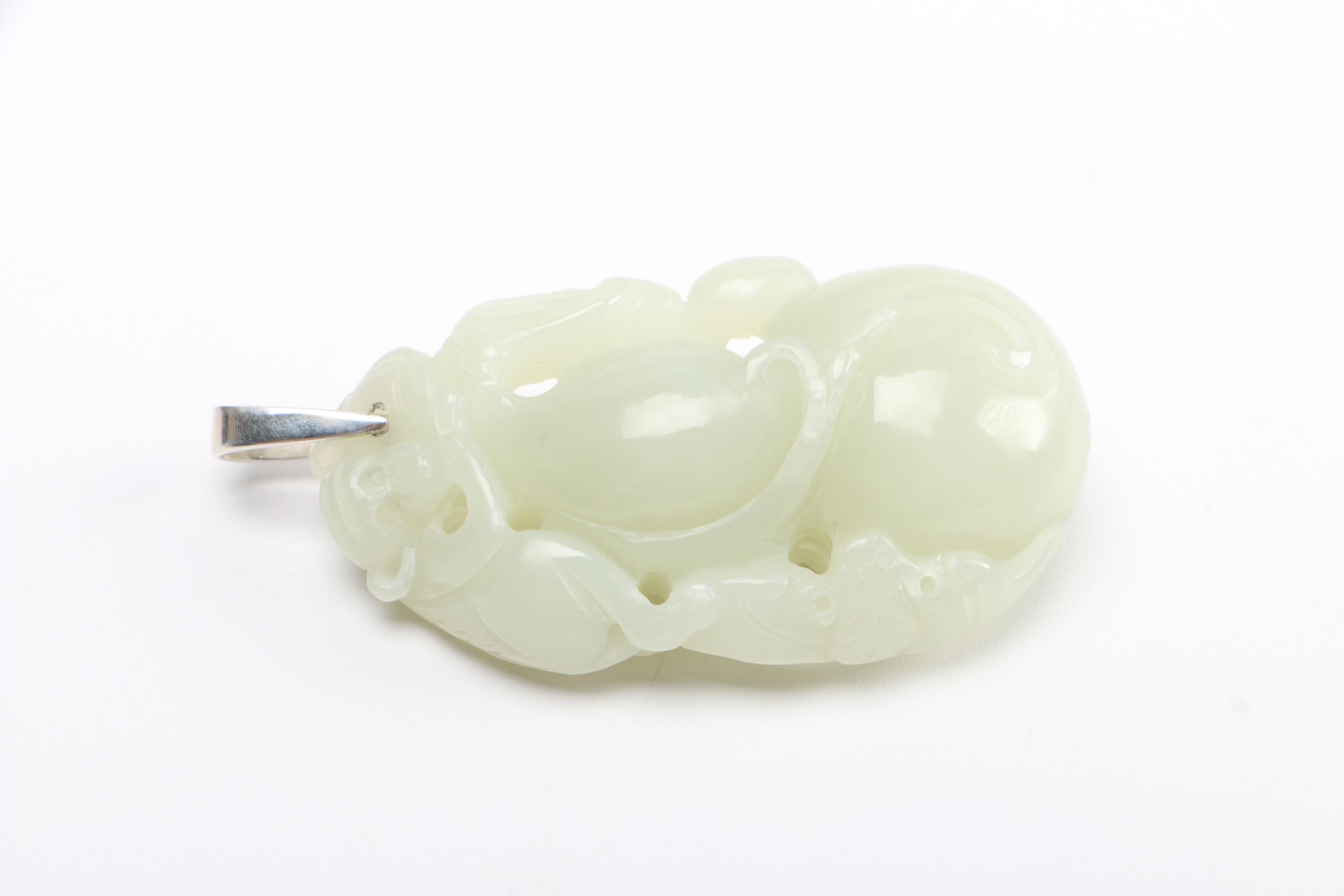 Selection of Pendants Featuring Jadeite and Serpentine