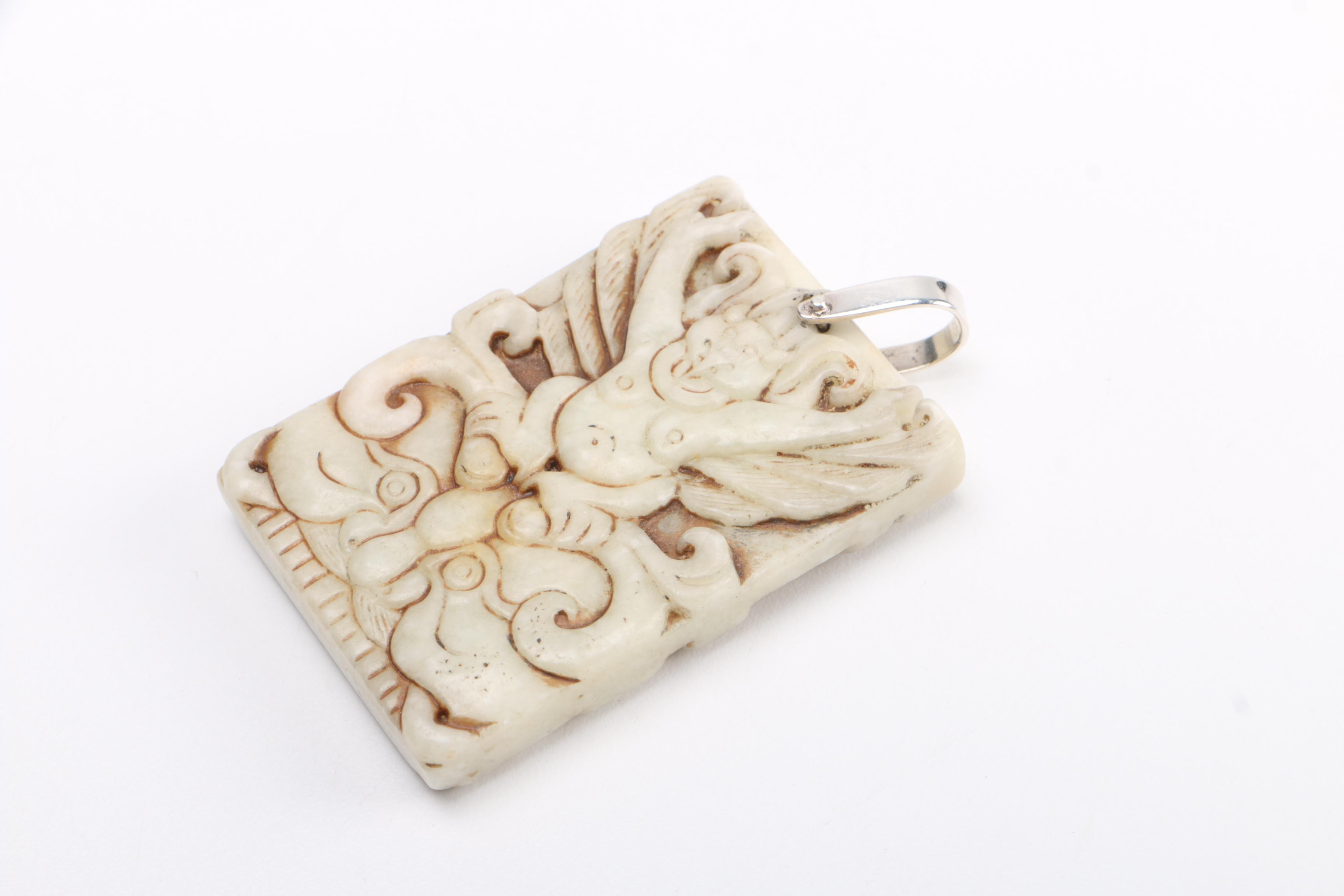 Selection of Pendants Featuring Jadeite and Serpentine