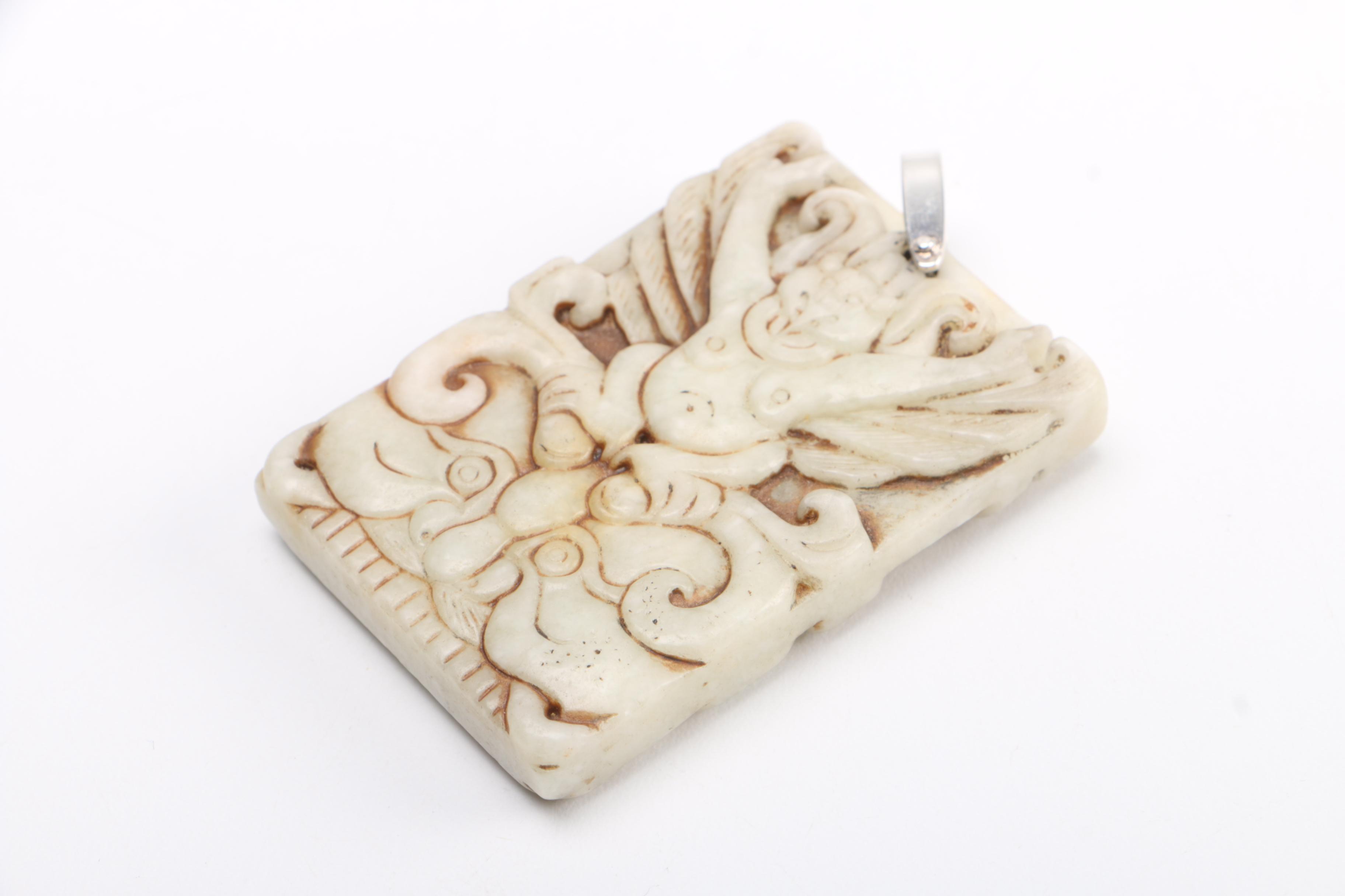 Selection of Pendants Featuring Jadeite and Serpentine