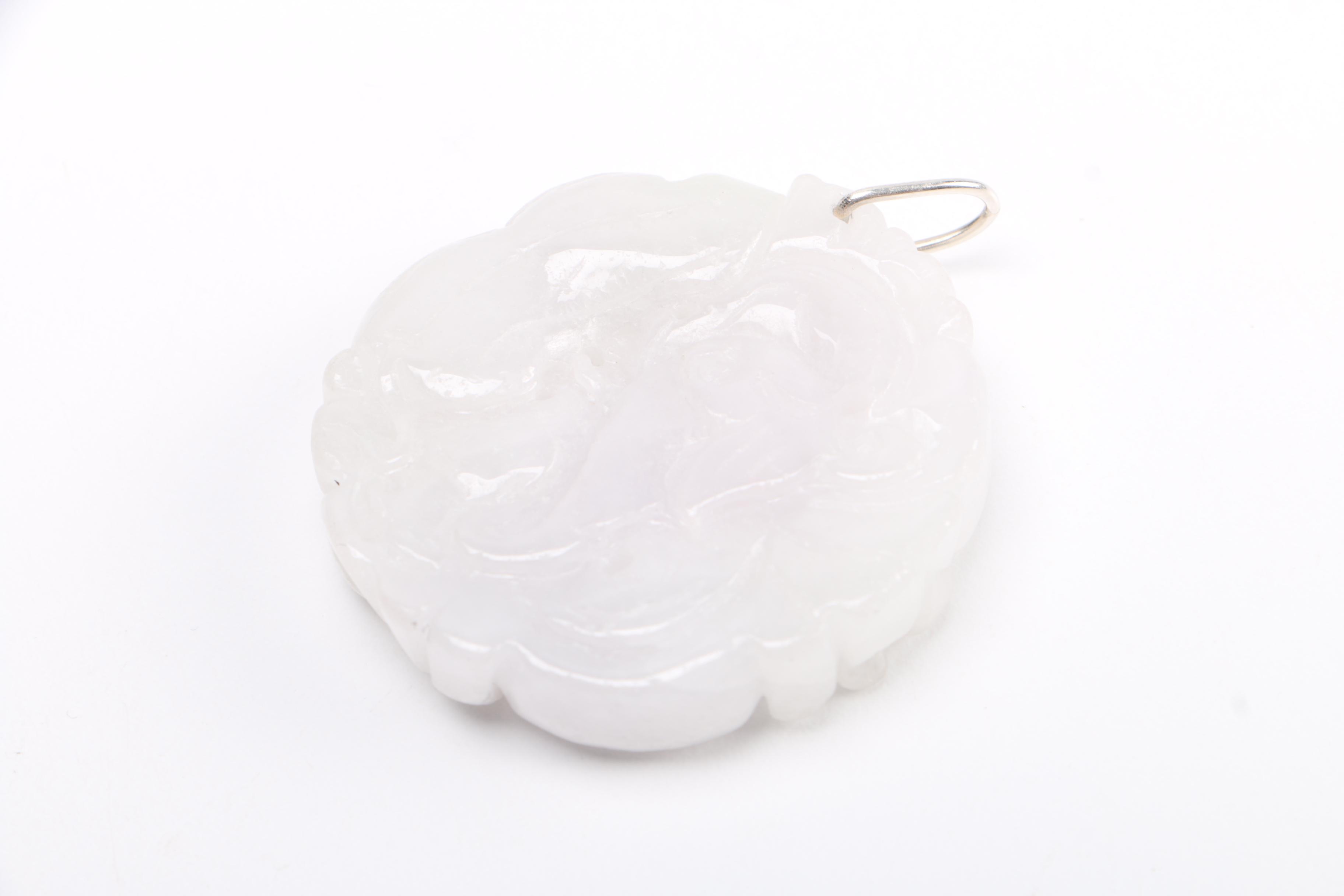 Selection of Pendants Featuring Jadeite and Serpentine