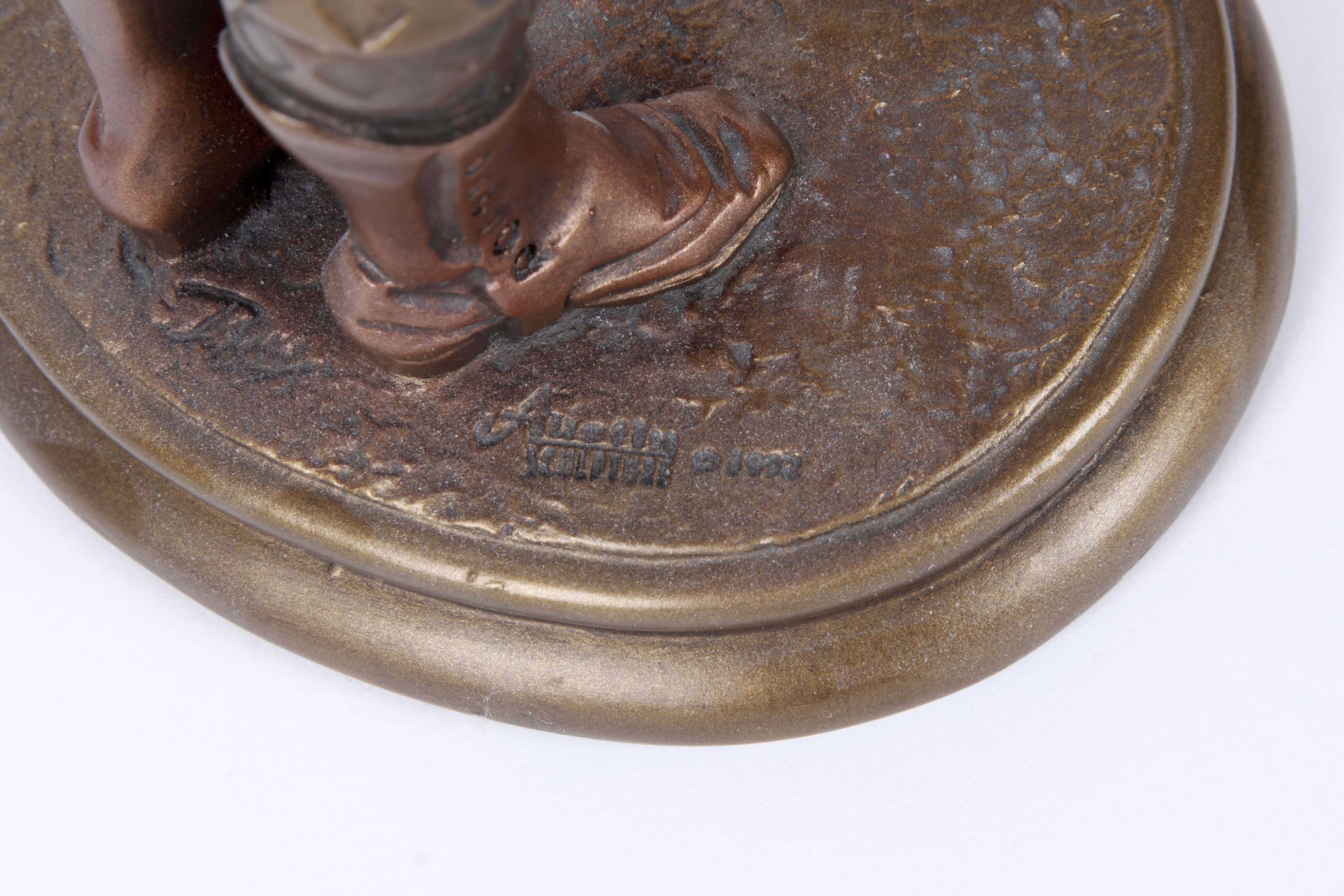 A Group of Golfing Sculptures by Austin Ltd.