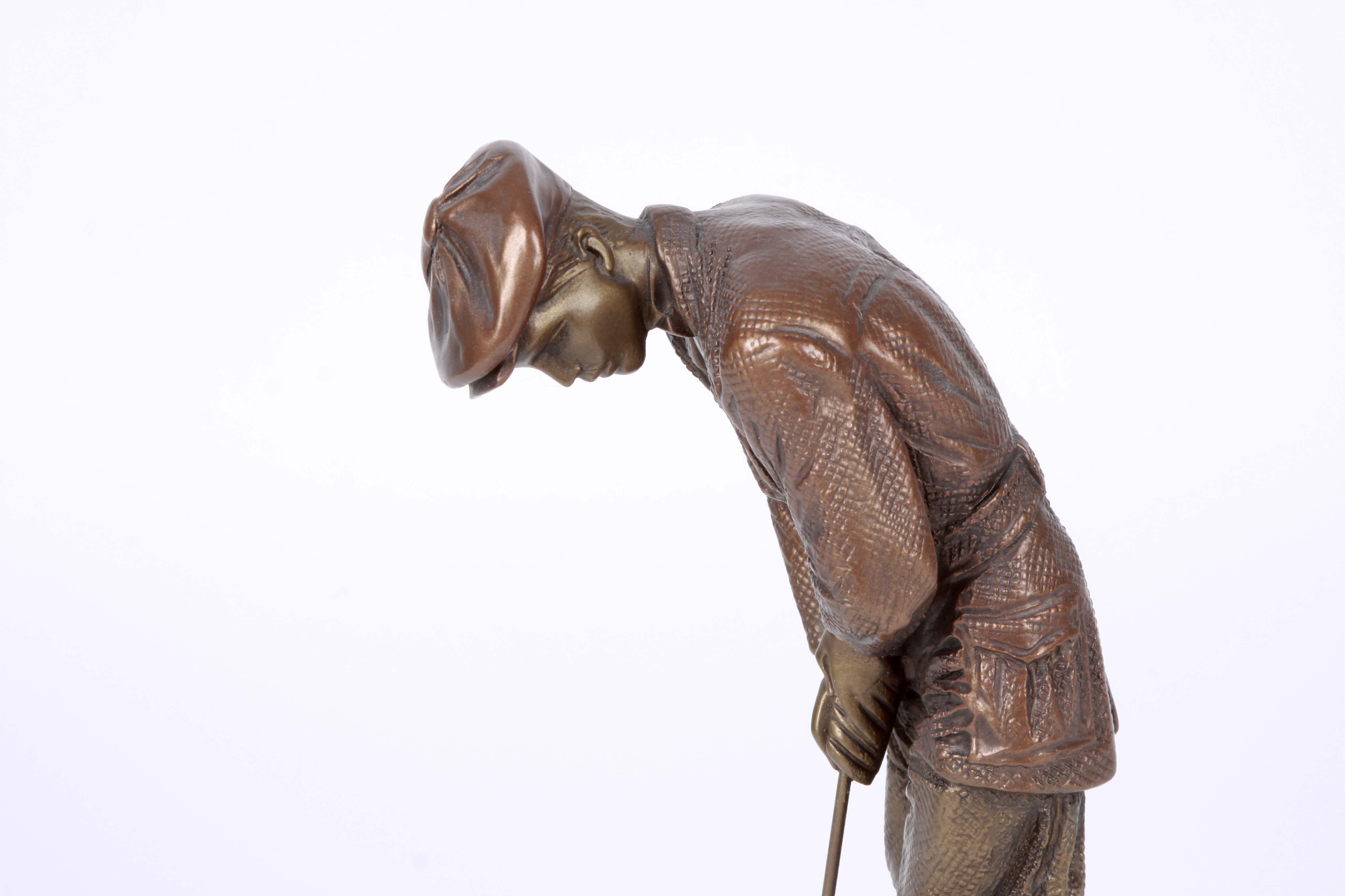 A Group of Golfing Sculptures by Austin Ltd.