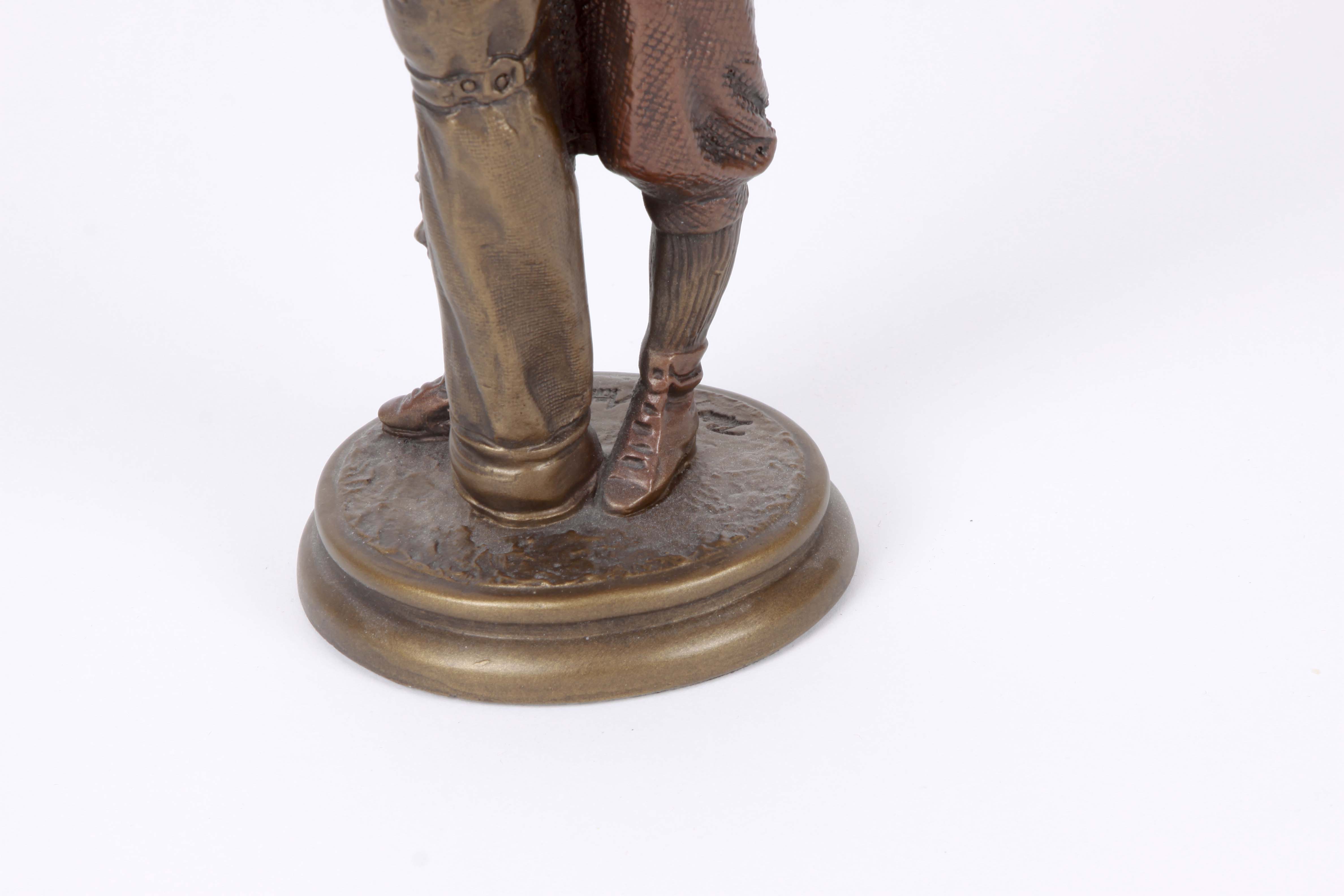 A Group of Golfing Sculptures by Austin Ltd.