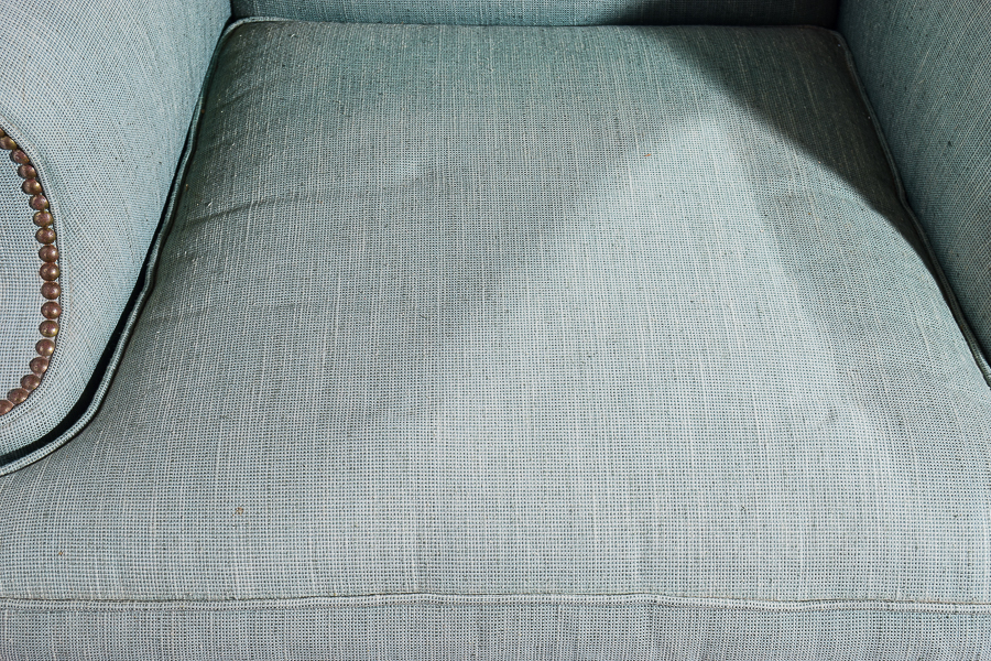 Grey Upholstered Wing Back Armchair