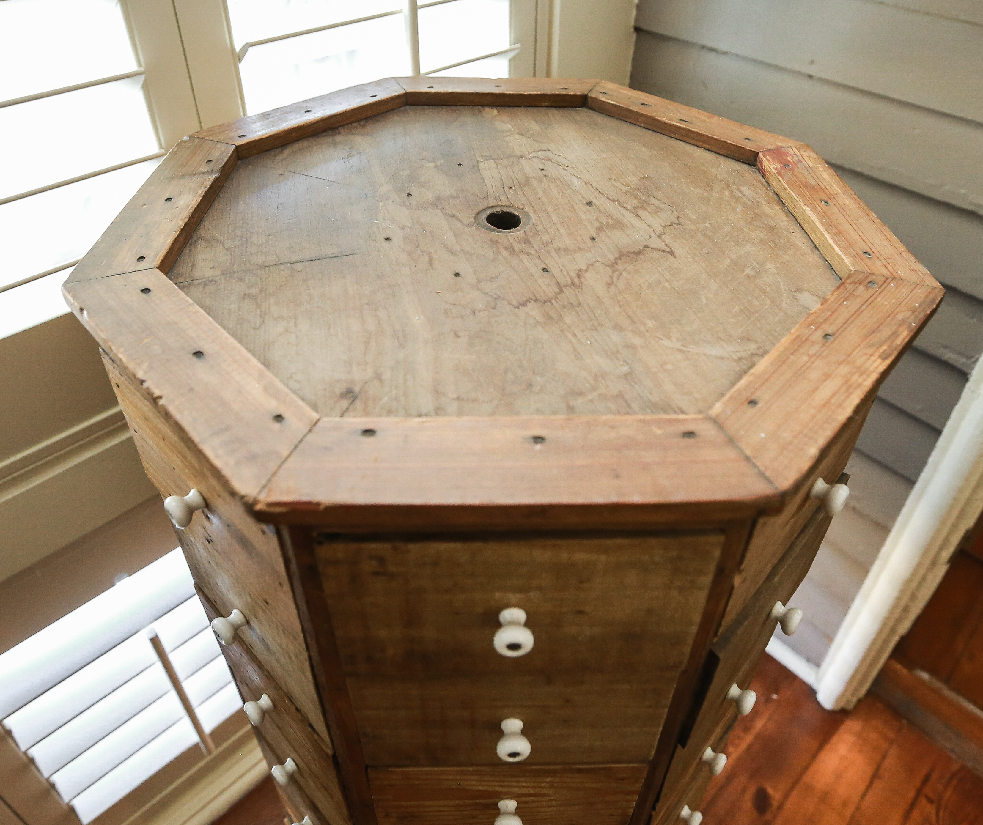 Antique Octagonal Rotating Hardware Cabinet