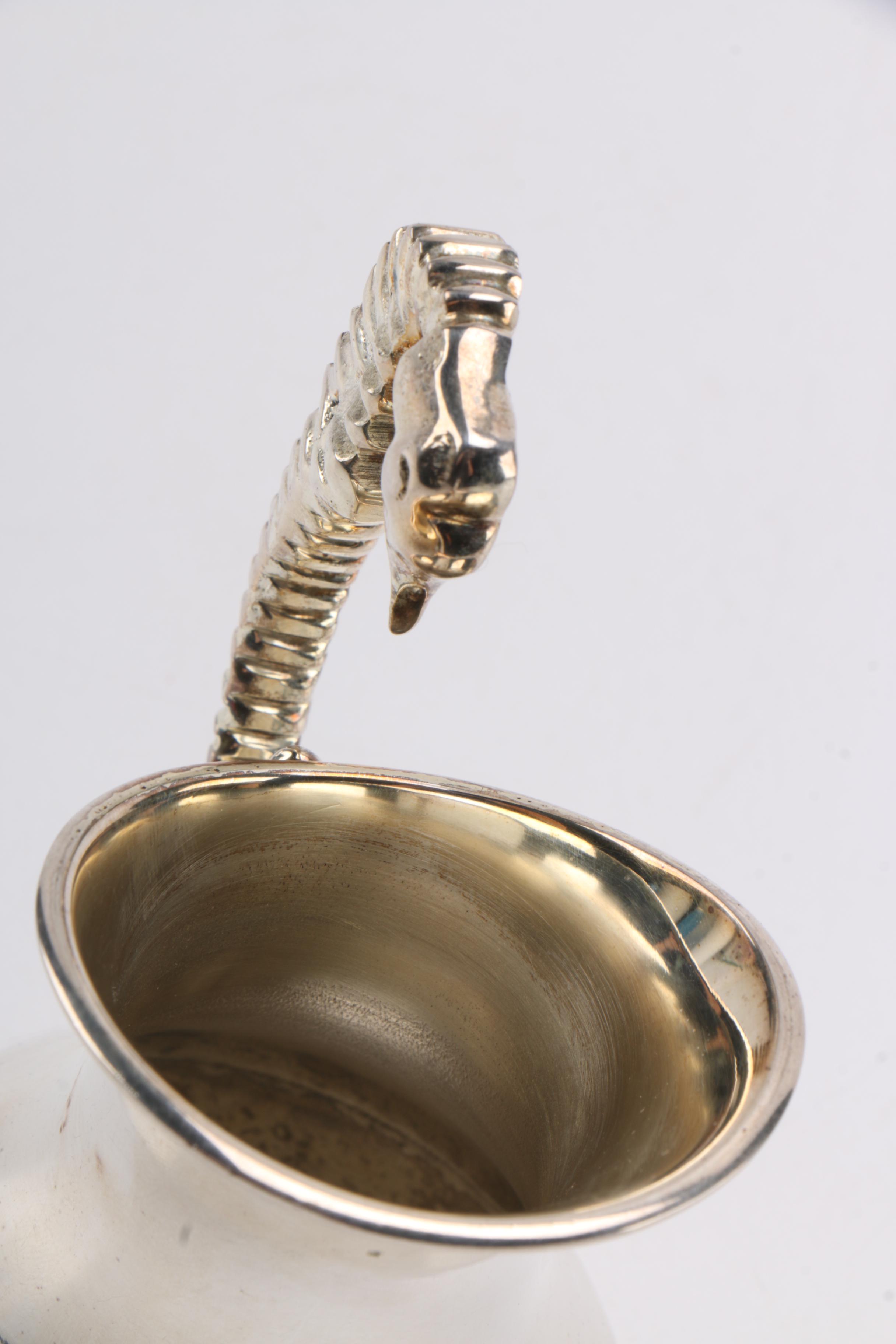 Steel Sea Horse Handled Jugs