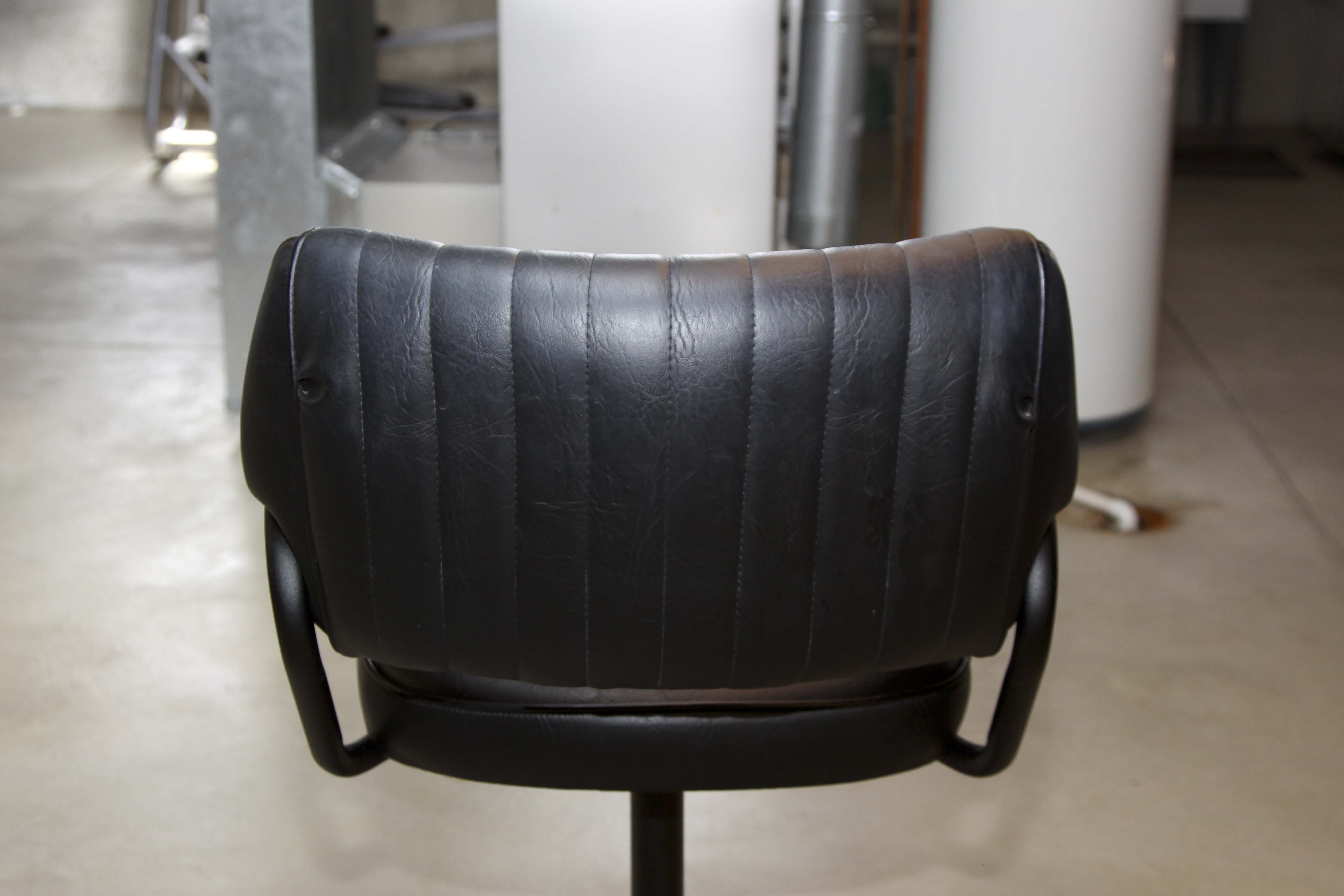Pair of Mid Century Modern Black Leather Swivel Stools