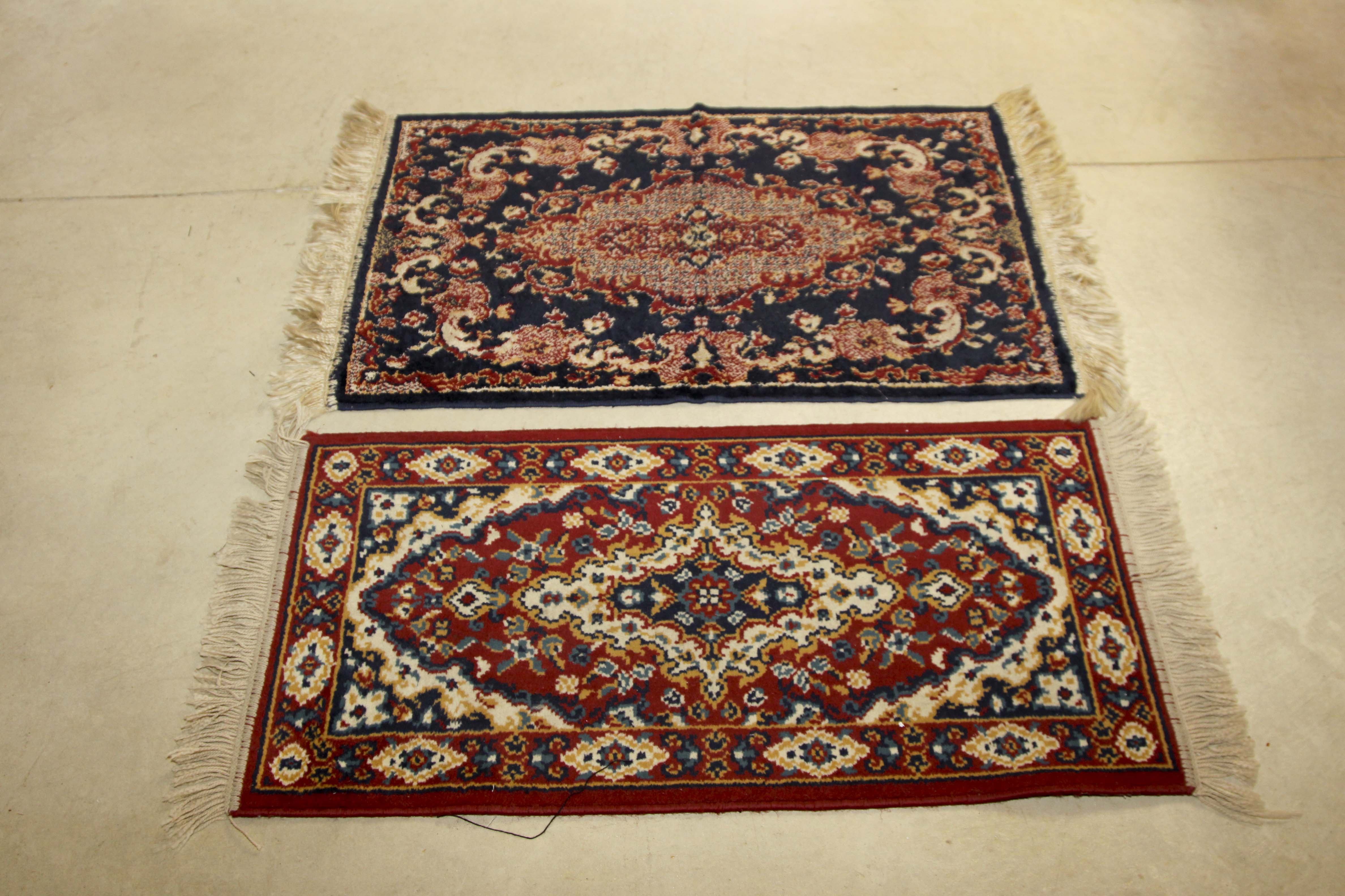 Two Small Machine Woven Accent Rugs