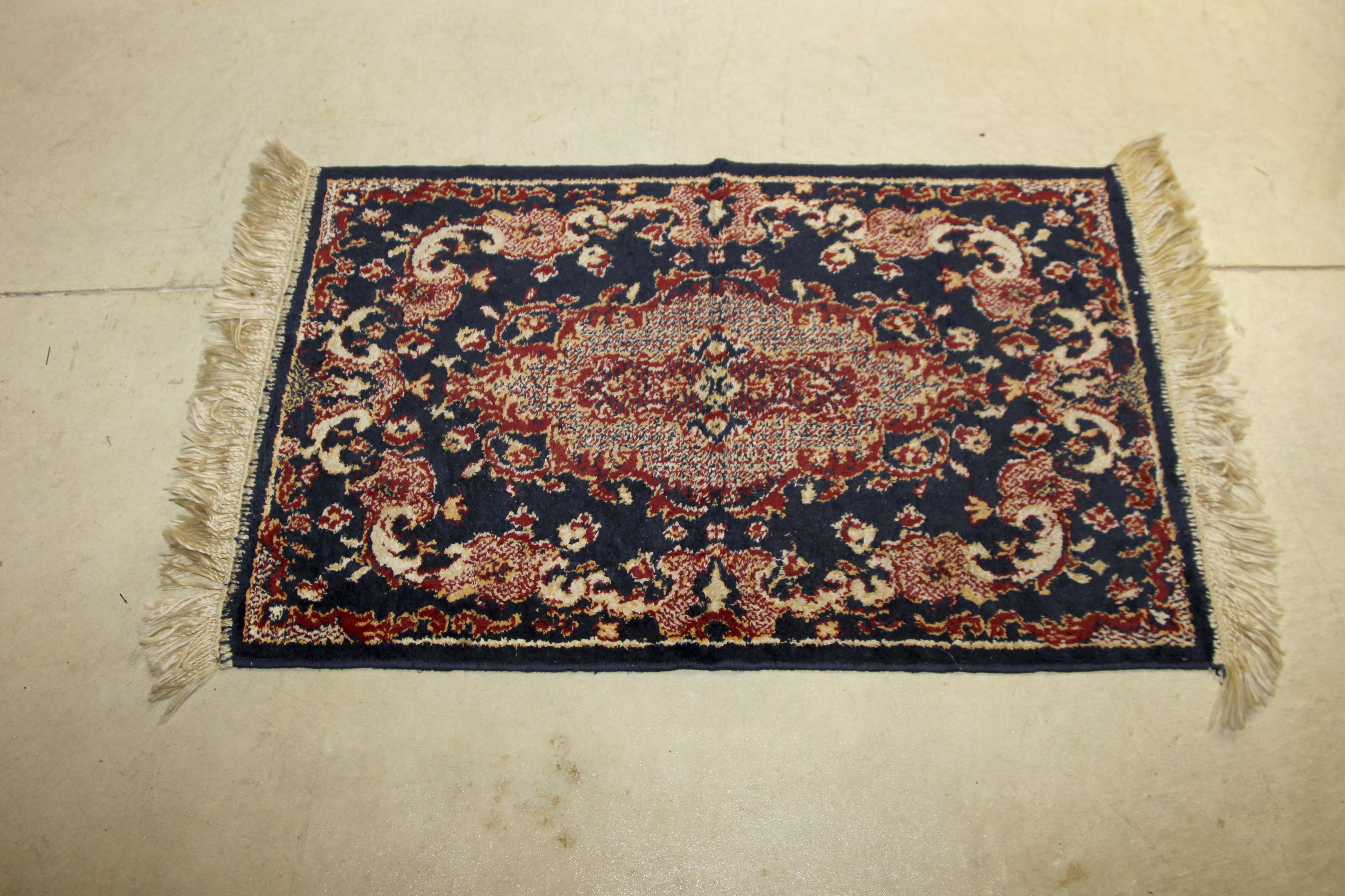 Two Small Machine Woven Accent Rugs