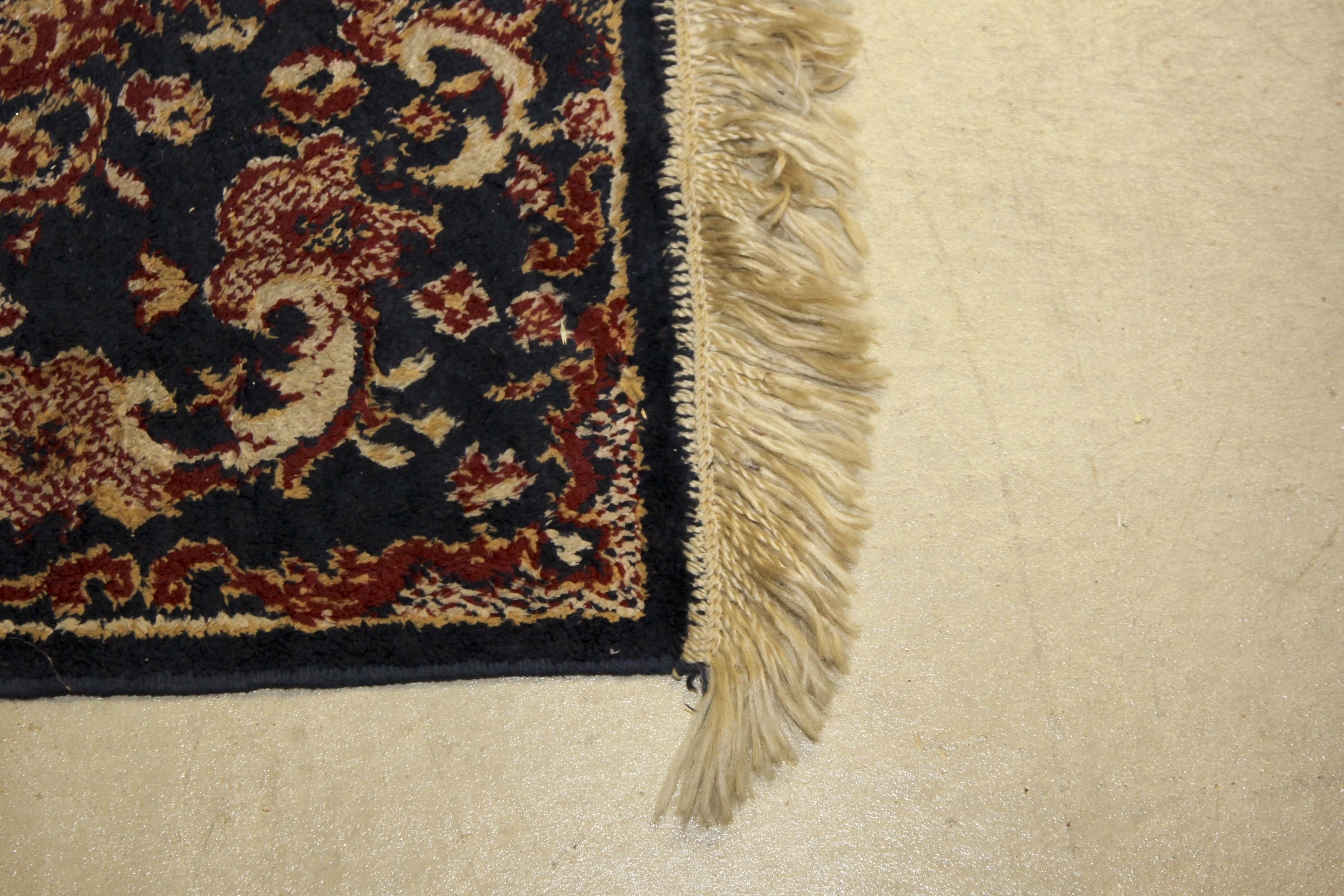 Two Small Machine Woven Accent Rugs