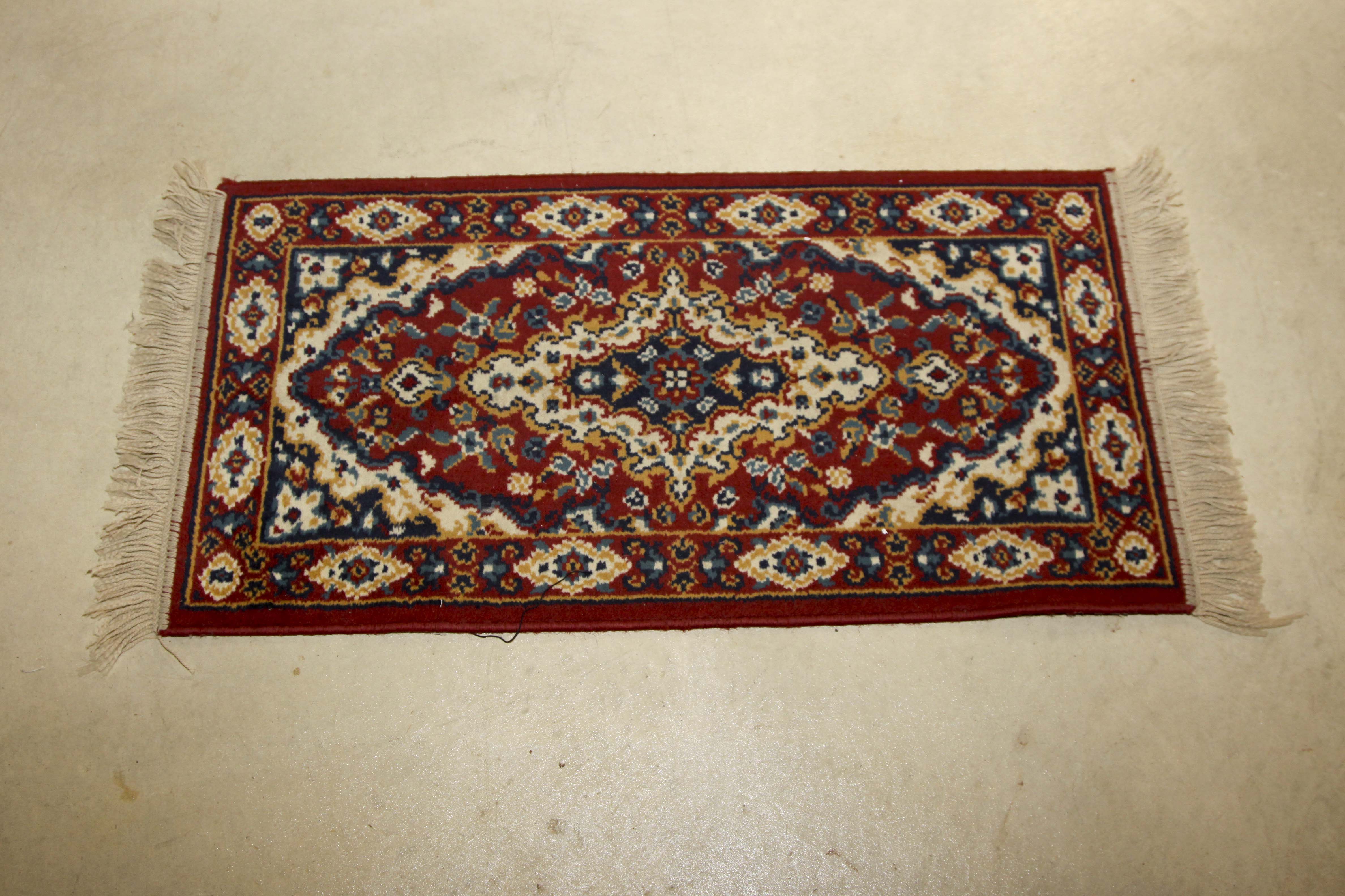 Two Small Machine Woven Accent Rugs